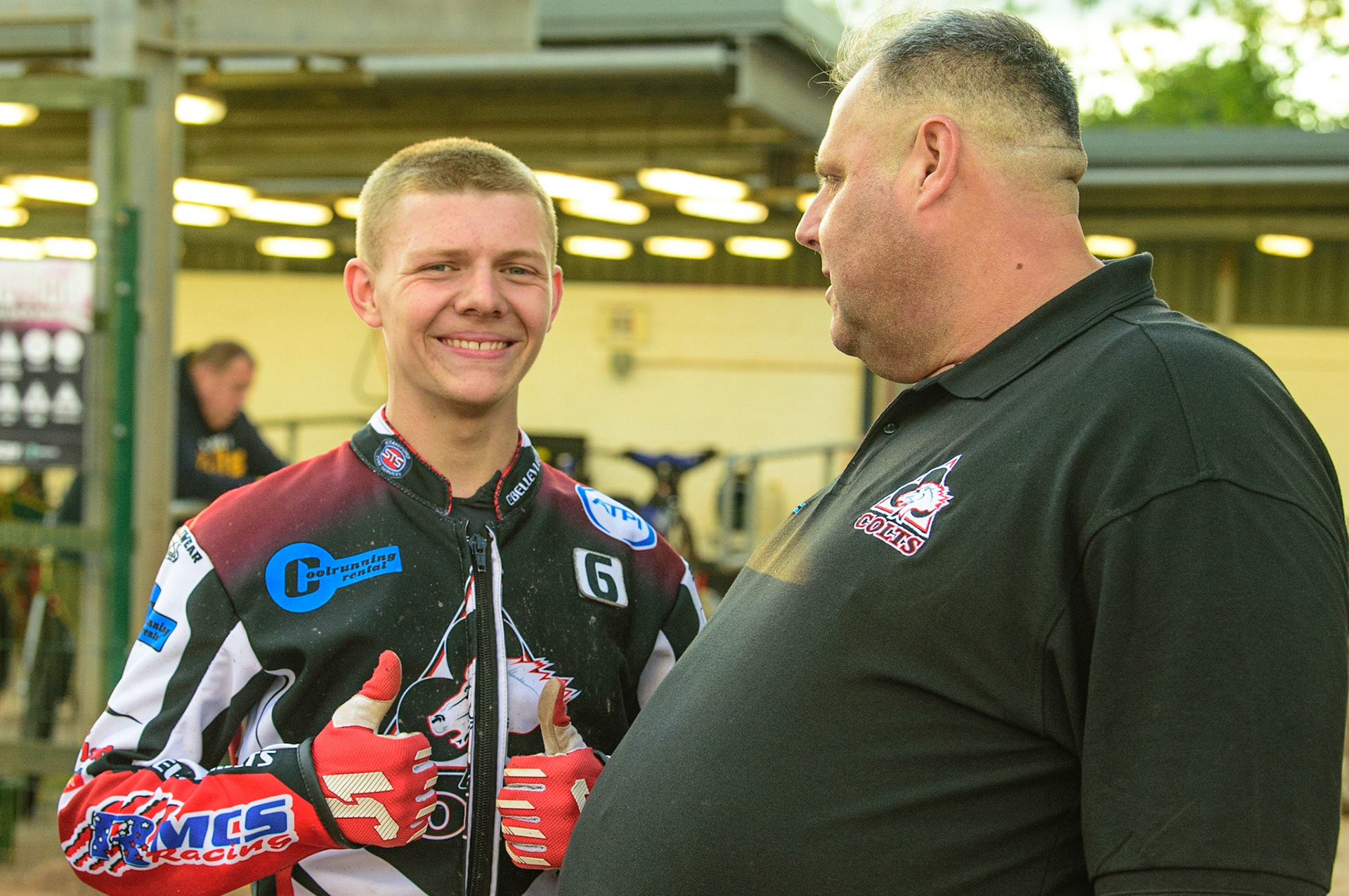 Archie Freeman  (left) with Belle Vue Cool Running Colts team manager Steve Williams during the National Development League match between Belle Vue Colts and Mildenhall Fens Tigers at the National Speedway Stadium, Manchester on Friday 15th July 2022. (Credit: Ian Charles | MI News)