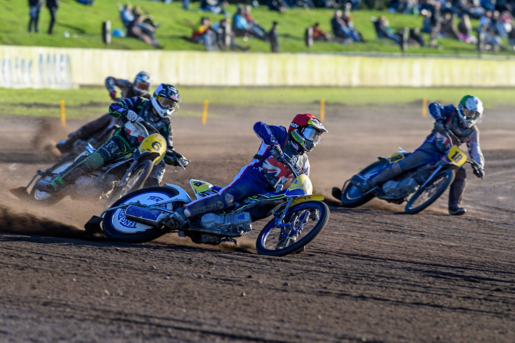 Chris Harris (Red) leads  team mate Zach Wajtknecht, Denmark’s Jacob Bukhave (Yellow) and Tobias Thomsen (Black &amp; White) during the FIM Long Track Of Nations event at the Speed Centre Roden on Sunday 24th September 2023. (Photo: Ian Charles | MI News)
