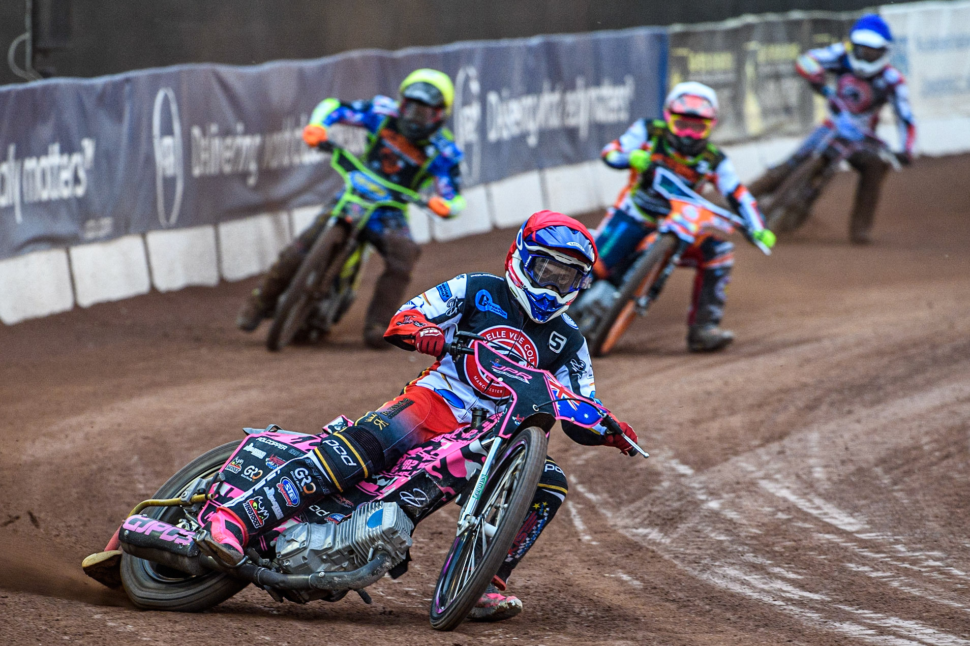 James Pearson (Red) leads Ben Trigger (White), George Congreve (Yellow) and Paul Bowen (Blue) during the National Development League match between Belle Vue Colts and Mildenhall Fens Tigers at the National Speedway Stadium, Manchester on Friday 26th May 2023. (Photo: Ian Charles | MI News)