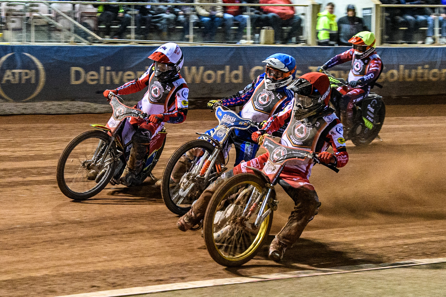 Norick Blodorn in Red rides inside Niels-Kristian Iversen in Blue and Tate Zischke in White with Emil Sayfutdinov in Yellow behind during the Peter Craven Memorial Trophy at the National Speedway Stadium, Manchester on Monday 17th March 2025. (Photo: Ian Charles | MI News)