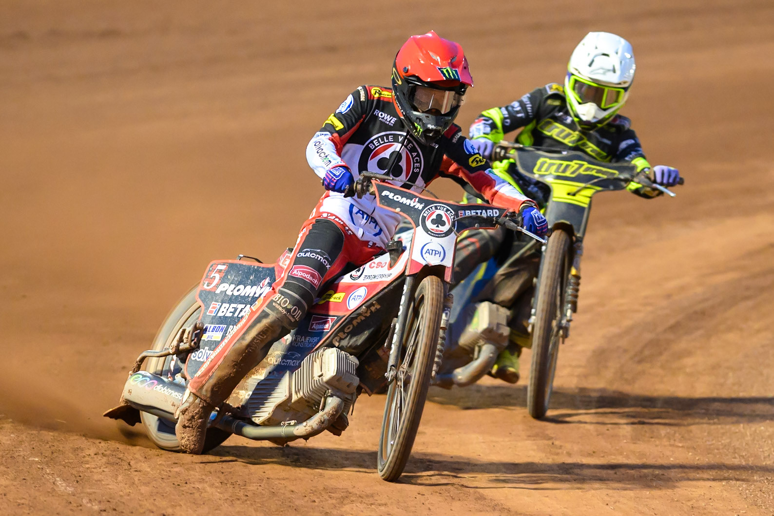 Brady Kurtz of Belle Vue Aces in Red leading Tom Brennan of Ipswich Witches  in White during the Rowe Motor Oil Premiership match between Belle Vue Aces and Ipswich Witches at the National Speedway Stadium, Manchester on Monday 20th April 2026. (Photo: Ian Charles | MI News)
