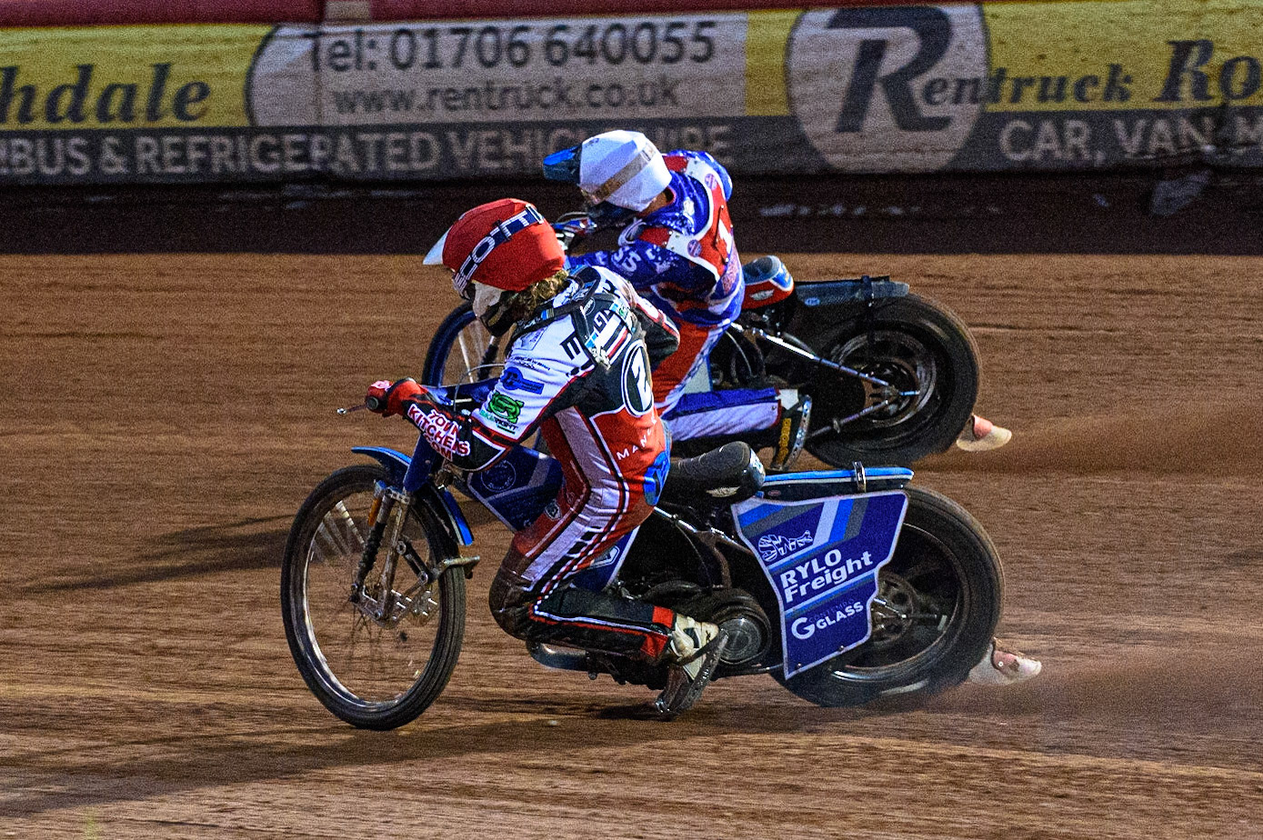 MANCHESTER, UK. JULY 23RD Harry McGurk  (Red) inside Jake Knight  (White) during the National Development League match between Belle Vue Colts and Eastbourne Seagulls at the National Speedway Stadium, Manchester on Friday 23rd July 2021. (Credit: Ian Charles | MI News)