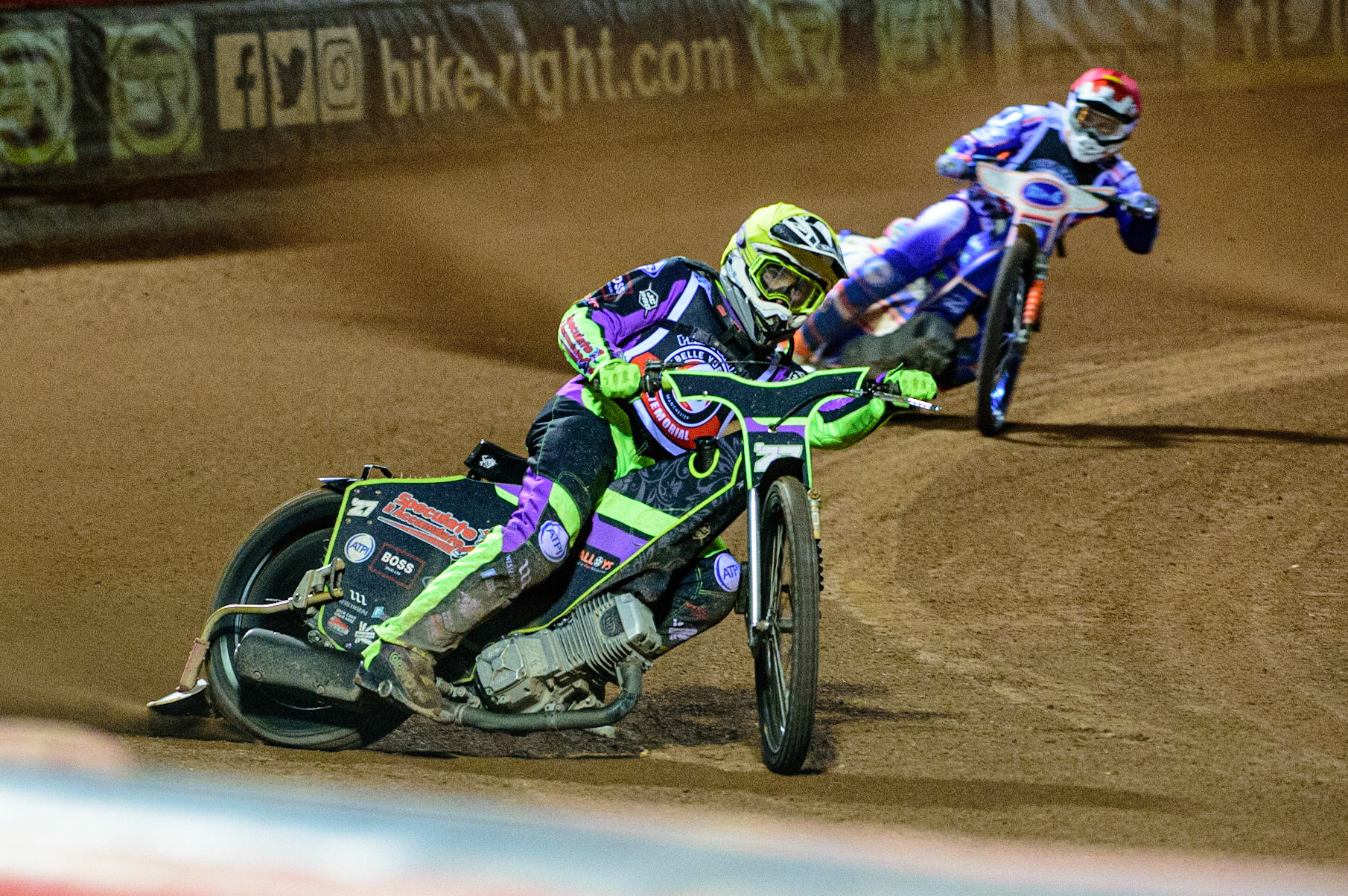 MANCHESTER, UK. OCT 23RD  Tom Brennan  (Yellow) leads Jason Crump  (Red)  during the Peter Craven Memorial Trophy event at the National Speedway Stadium, Manchester on Saturday 23rd October 2021. (Credit: Ian Charles | MI News)
