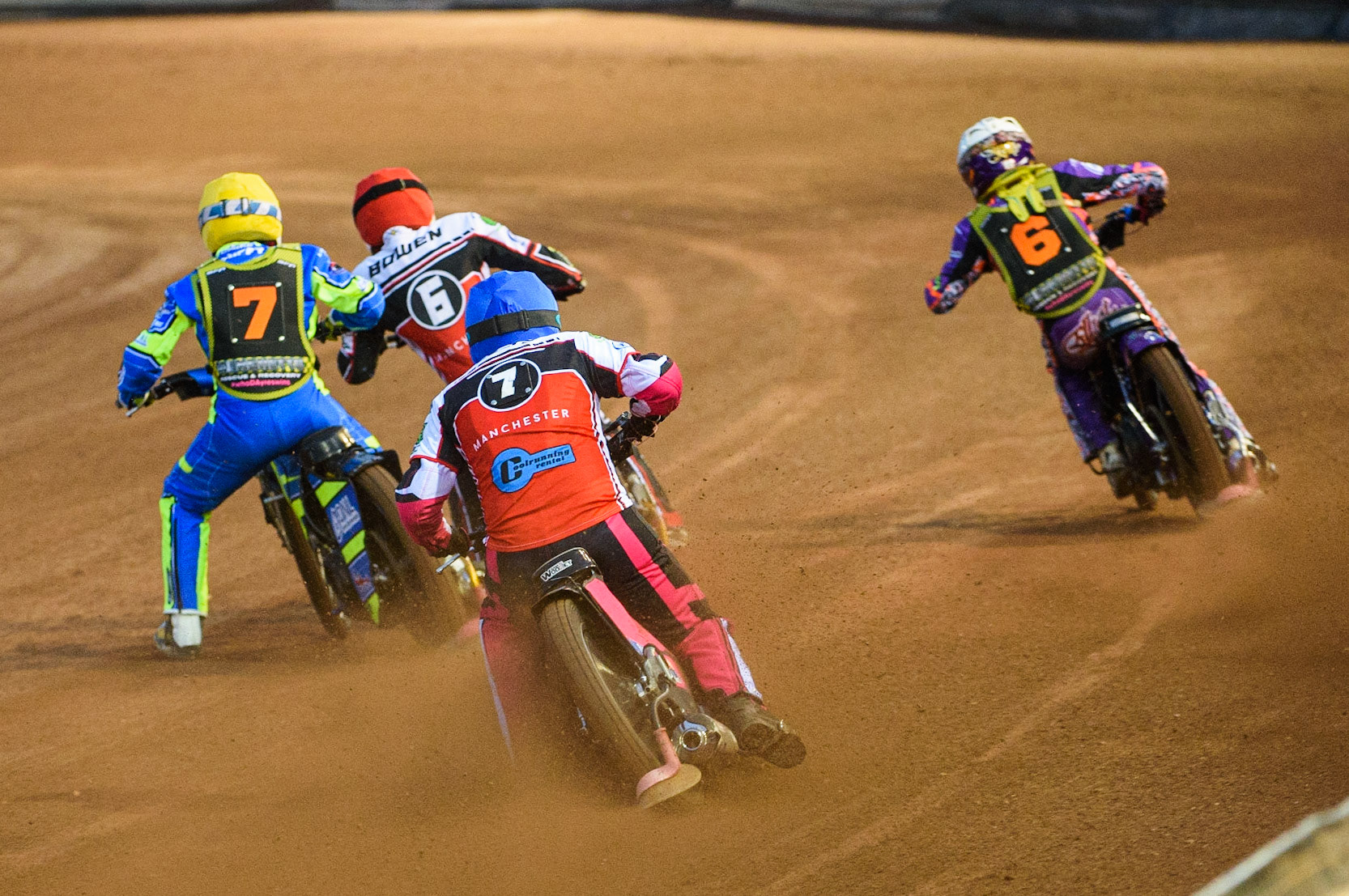 MANCHESTER, SEPT 3RD. Sam Woolley  (Blue) chases Luke Muff  (Yellow), Paul Bowen  (Red) and Elliot Kelly  (White) during the National Development League match between Belle Vue Aces and Mildenhall Fens Tigers at the National Speedway Stadium, Manchester on Friday 3rd September 2021. (Credit: Ian Charles | MI News)