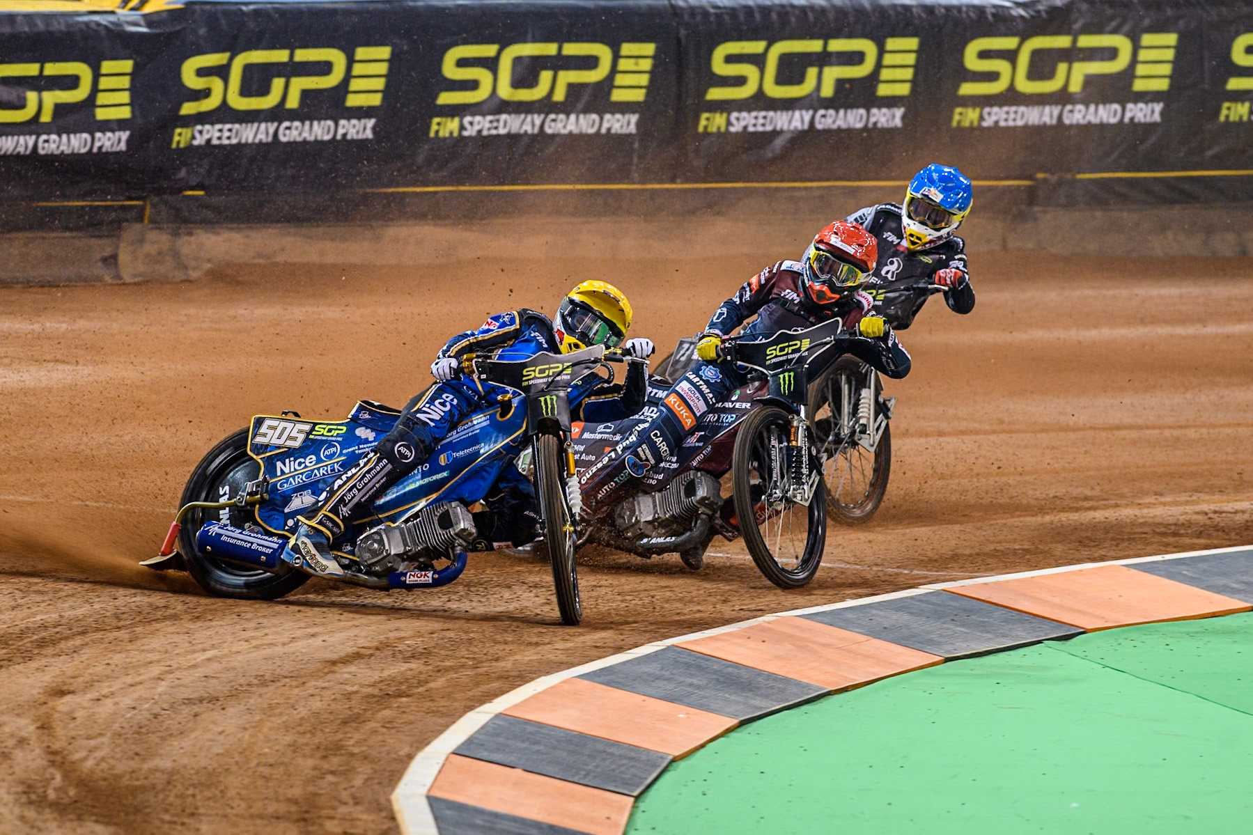 Robert Lambert (505) of Great Britain in Yellow leading Dominik Kubera (415) of Poland in Red and Maciej Janowski (71) of Poland in Blue during the FIM Speedway Grand Prix of Great Britain at The Principality Stadium, Cardiff on Saturday 17th August 2024. (Photo: Ian Charles | MI News)