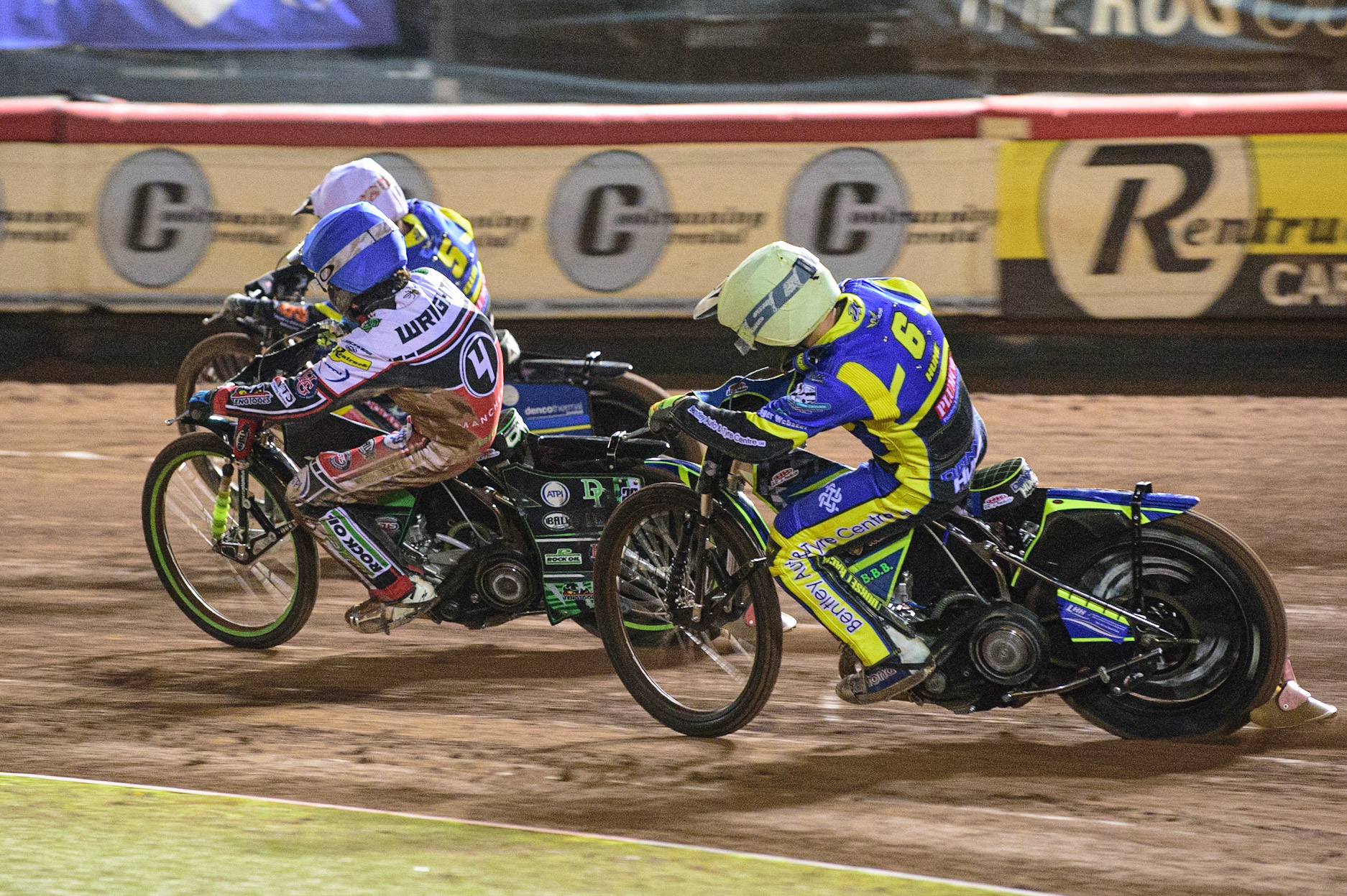 MANCHESTER, UK. OCT 7TH  Danyon Hume  (Yellow) chases Charles Wright  (Blue) and Adam Ellis  (White) during the SGB Premiership Play off Semi-Final Second Leg between Belle Vue Aces and Sheffield Tigers at the National Speedway Stadium, Manchester on Thursday 7th October 2021. (Credit: Ian Charles | MI News)
