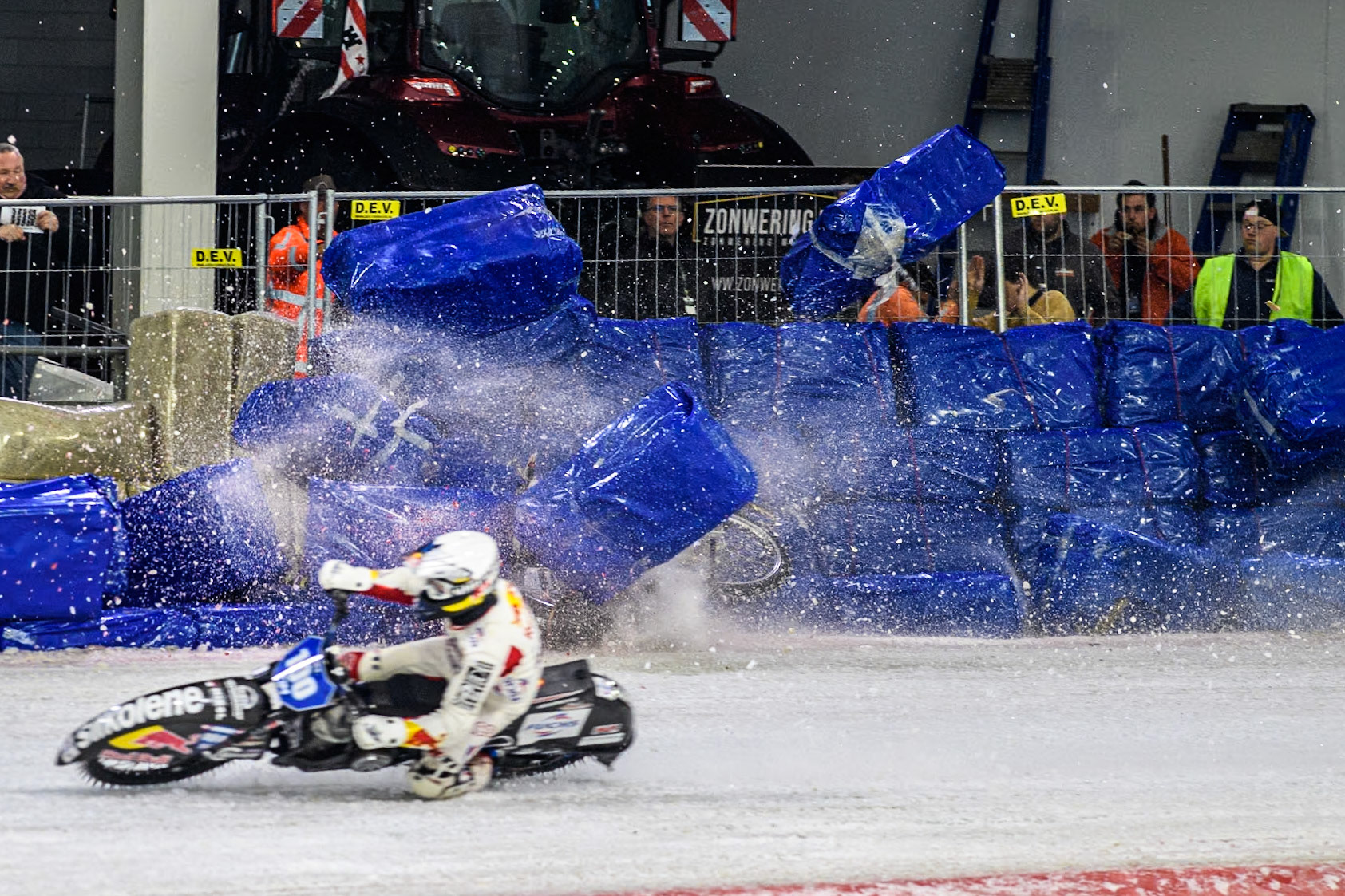 Germany's Max Niedermaier (88) crashes into the bales during the FIM Ice Speedway Gladiators World Championship Final 4 at Ice Rink Thialf, Heerenveen on Sunday 7th April 2024. (Photo: Ian Charles | MI News)
