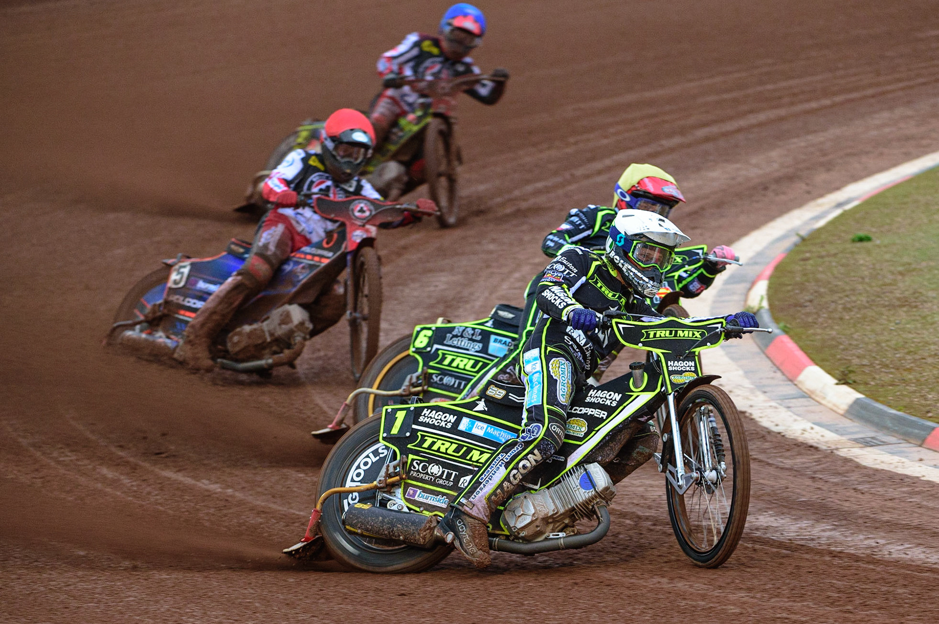 MANCHESTER, UK. JUN 6TH   Jason Doyle (White) and Ben Barker  (Yellow) leads Brady Kurtz  (Red) and Jye Etheridge  (Blue) during the SGB Premiership match between Belle Vue Aces and Ipswich Witches at the National Speedway Stadium, Manchester on Monday 6th June 2022. (Credit: Ian Charles | MI News)