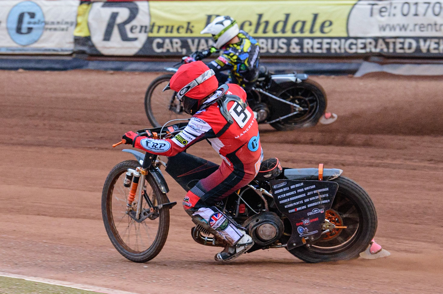 MANCHESTER, UK. JUN 24TH  Jack Smith  (Red) chases Kyle Bickley  (White) during the National Development League match between Belle Vue Colts and Berwick Bullets at the National Speedway Stadium, Manchester on Friday 24th June 2022. (Credit: Ian Charles | MI News)