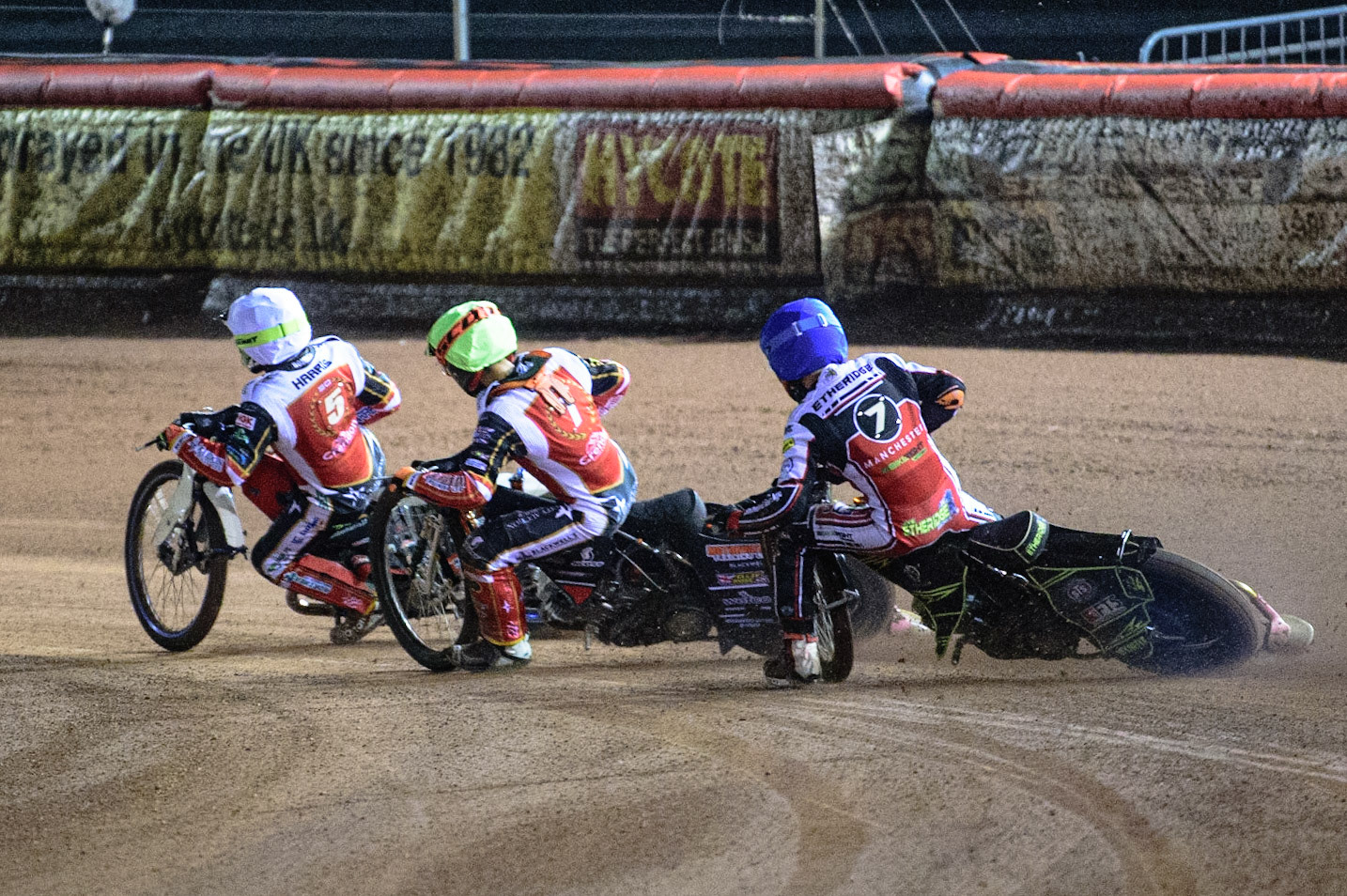 MANCHESTER, UK. OCT 11TH  Jye Etheridge  (Blue) chases Jordan Palin  (Yellow) and Chris Harris  (White) during the SGB Premiership Grand Final 1st Leg between Belle Vue Aces and Peterborough Panthers at the National Speedway Stadium, Manchester on Monday 11th October 2021. (Credit: Ian Charles | MI News)
