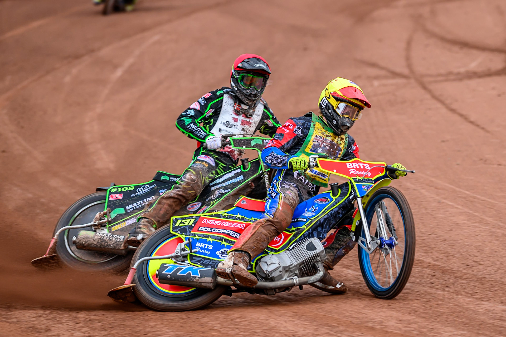 Tate Zischke of Australia in Yellow leading Villads Nagel of Denmark in Red during the FIM SGP2 Qualifying Round at the Peugeot Ashfield Stadium in Glasgow on Saturday 24th May 2025. (Photo: Ian Charles | MI News)