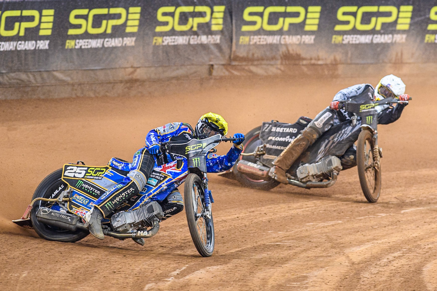 Jack Holder (25) of Australia in Yellow leading Maciej Janowski (71) of Poland in White during the FIM Speedway Grand Prix of Great Britain at The Principality Stadium, Cardiff on Saturday 17th August 2024. (Photo: Ian Charles | MI News)