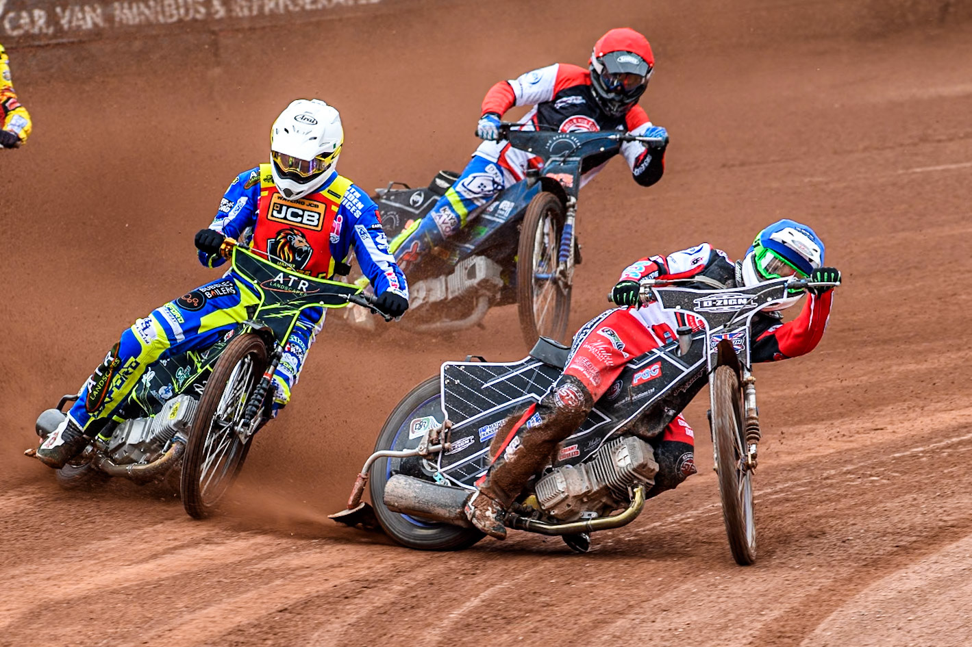 Belle Vue Colts' Jack Shimelt  in Blue rides inside Leicester Lion Cubs' Guest Rider Darryl Ritchings in White and Belle Vue Colts' Jack Kingston  in Red during the WSRA National Development League match between Belle Vue Colts and Leicester Lion Cubs at the National Speedway Stadium, Manchester on Friday 18th April 2025. (Photo: Ian Charles | MI News)