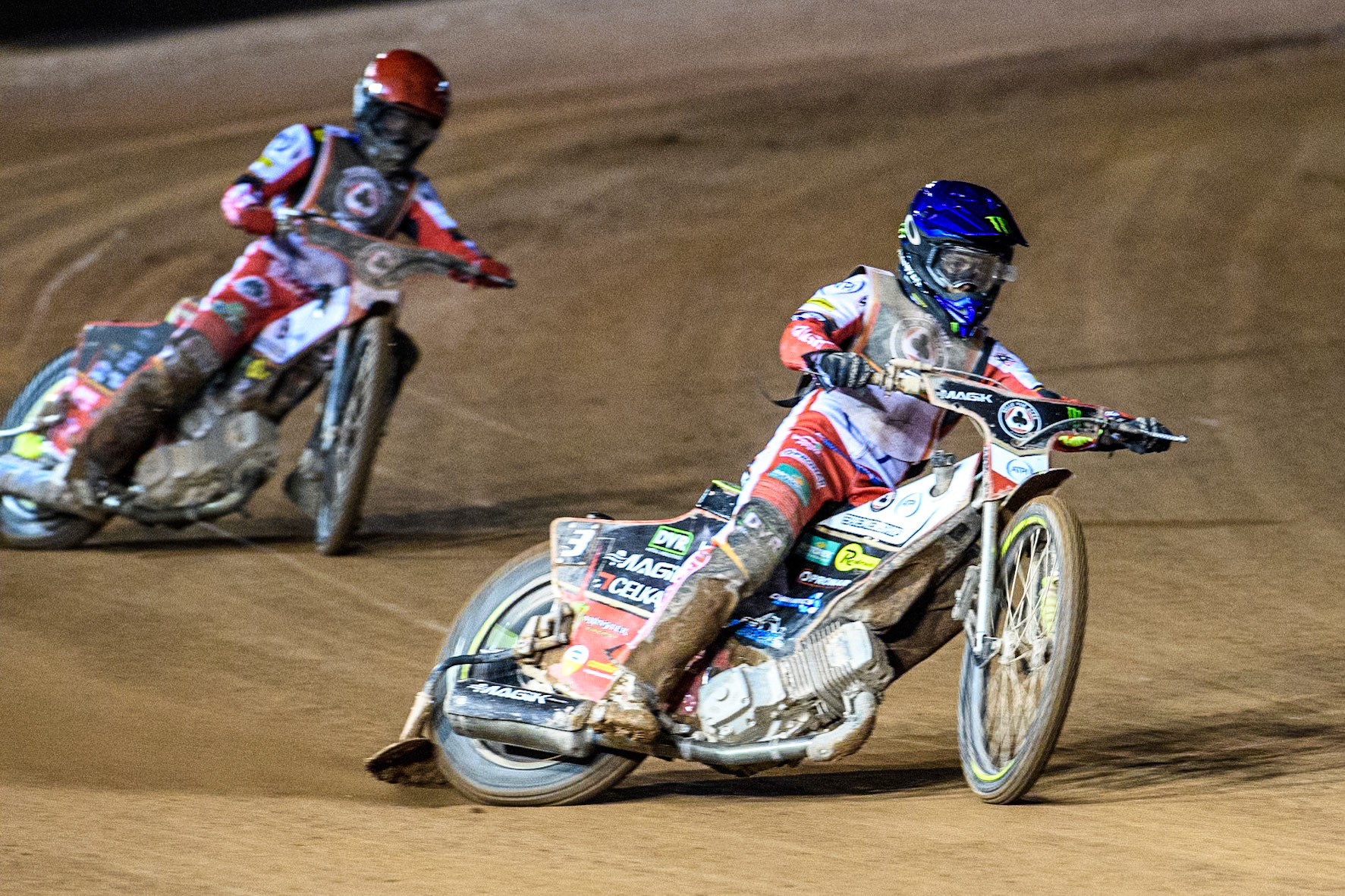 Jaimon Lidsey in Blue leading Tate Zischke in Red during the Peter Craven Memorial Trophy at the National Speedway Stadium, Manchester on Monday 17th March 2025. (Photo: Ian Charles | MI News)