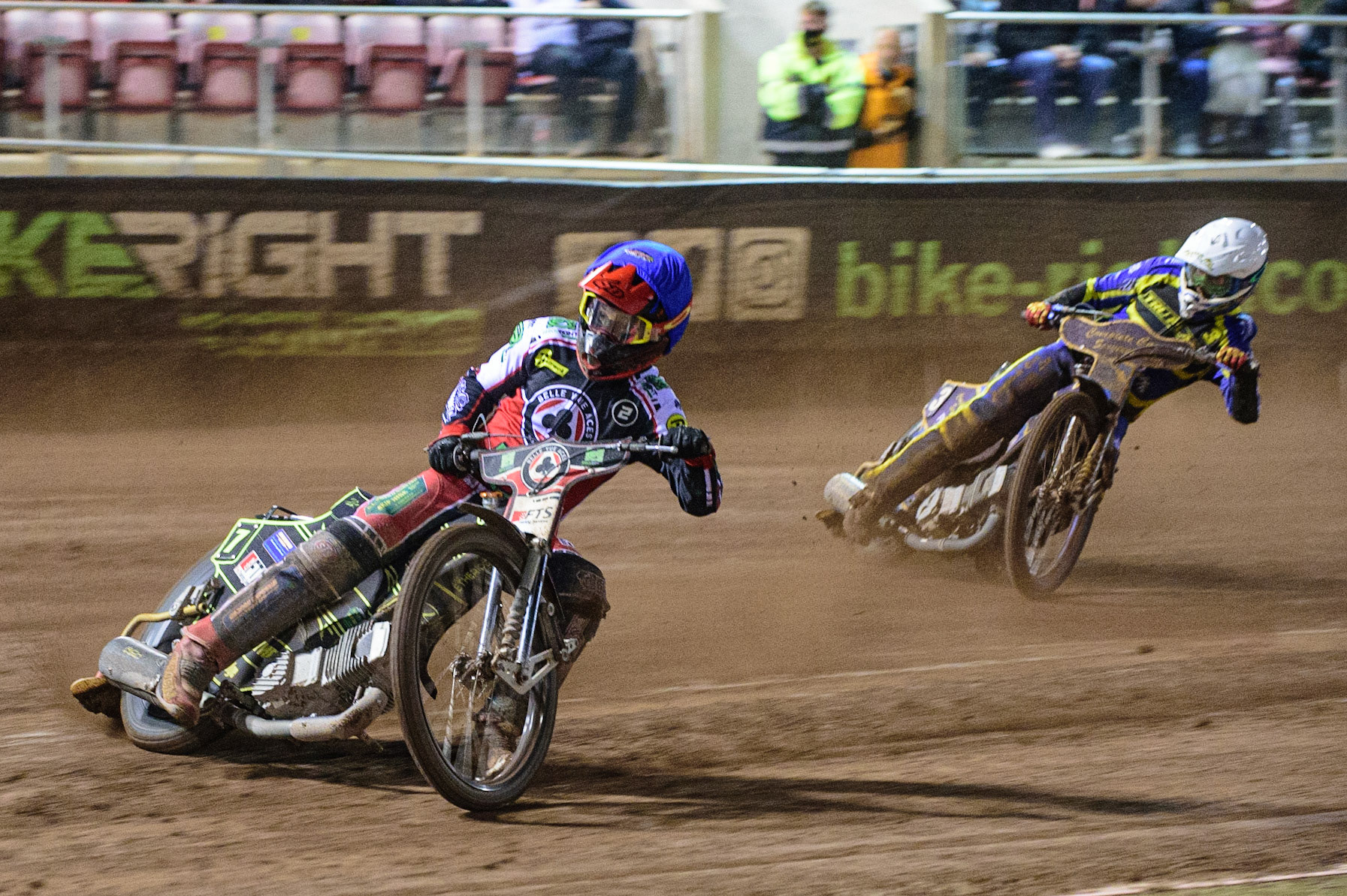 MANCHESTER, UK. OCT 7TH  Jye Etheridge   (Blue) leads Kyle Howarth  (White) during the SGB Premiership Play off Semi-Final Second Leg between Belle Vue Aces and Sheffield Tigers at the National Speedway Stadium, Manchester on Thursday 7th October 2021. (Credit: Ian Charles | MI News)