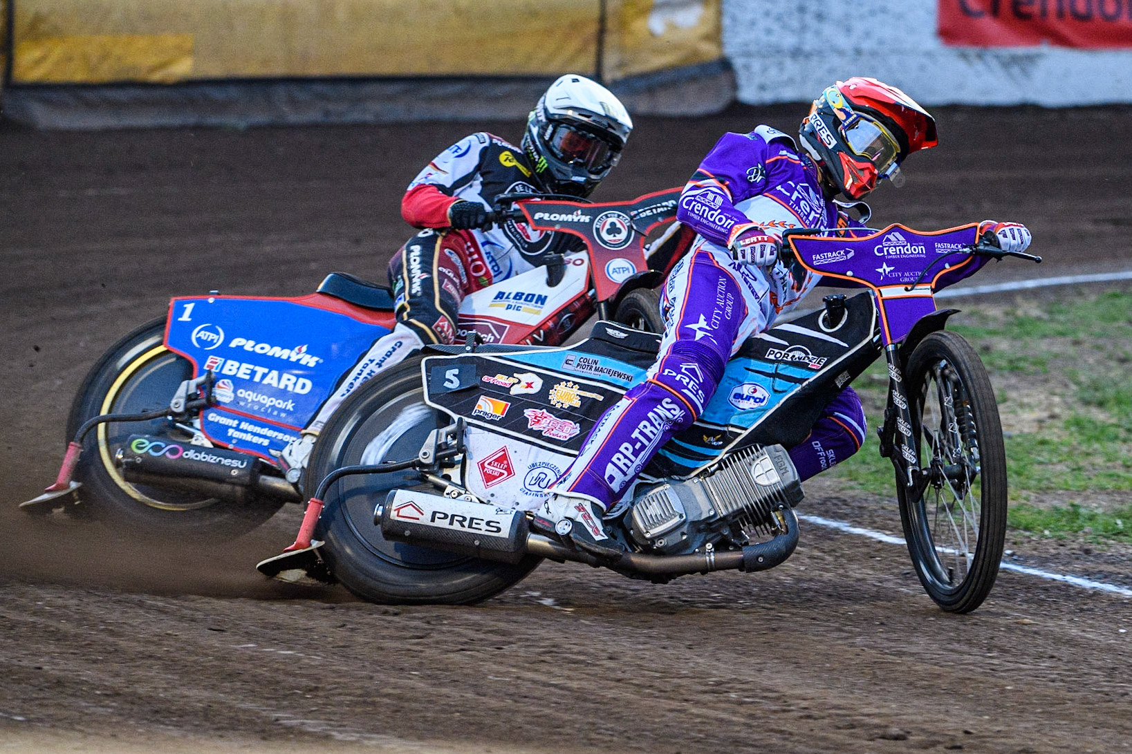 Vadim Tarasenko (Red) leads Dan Bewley (Red) during the Sports Insure Premiership match between Peterborough and Belle Vue Aces at East of England Showground, Peterborough on Monday 26th June 2023. (Photo: Ian Charles | MI News)