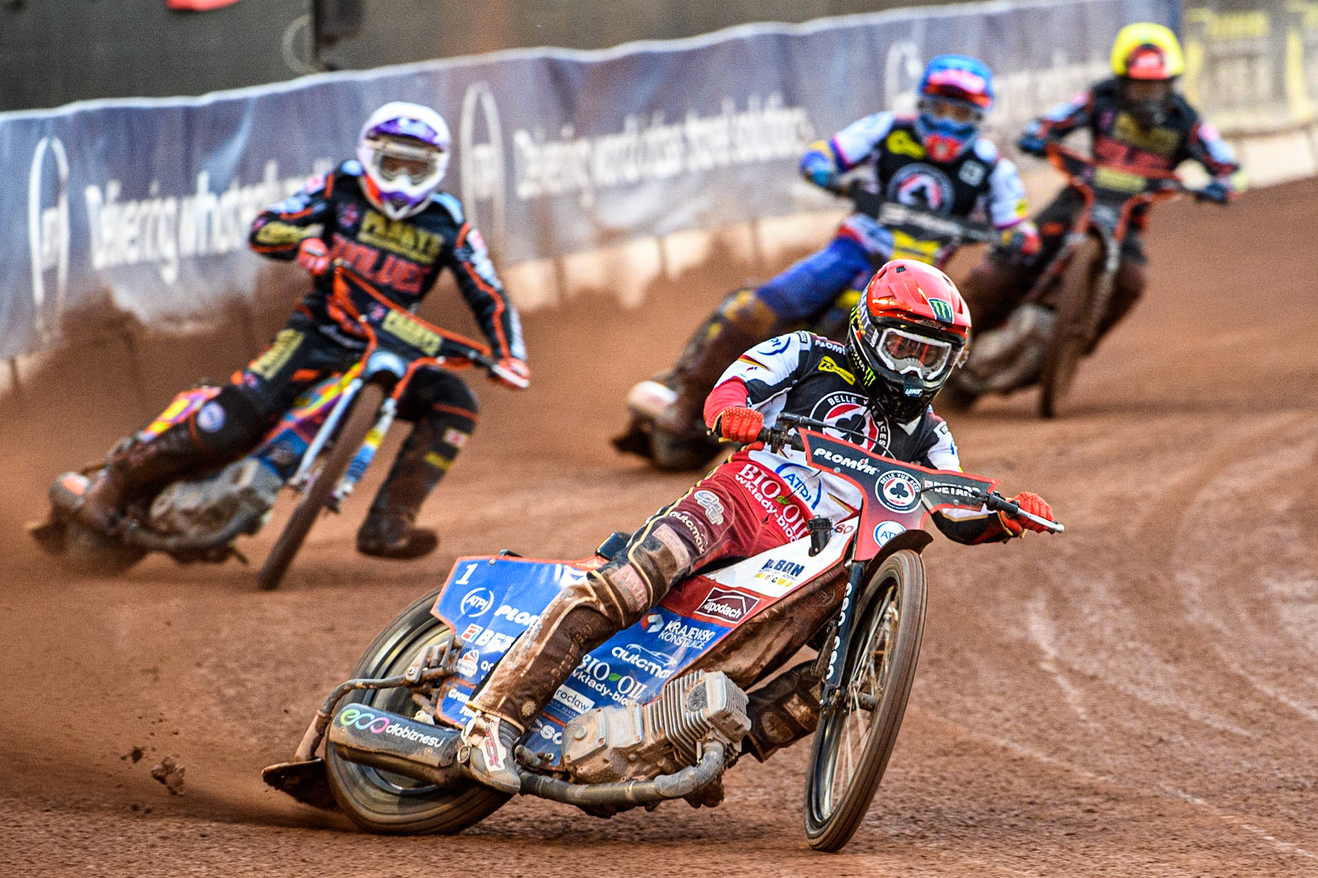Dan Bewley (Red) leads Rory Schlein (White) Paco Castagna (Blue) and Zach Cook (Yellow) during the Sports Insure Premiership Knock Out Cup Quarter Final 2nd Leg between Belle Vue Aces and Wolverhampton Wolves at the National Speedway Stadium, Manchester on Thursday 18th May 2023. (Photo: Ian Charles | MI News)
