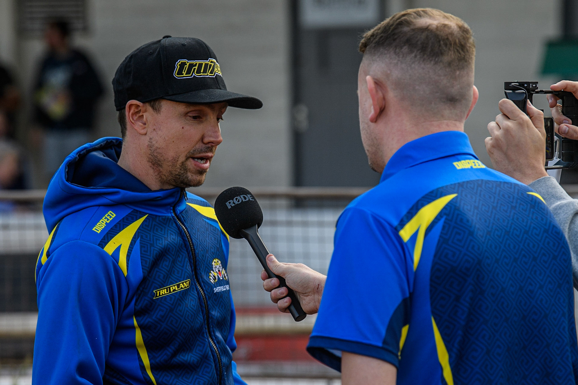 Sheffield TruPlant Tigers Team Manager Simon Stead (left) is interviewed by Sheffield meeting presenter Ryan Guest during the Sports Insure Premiership match between Sheffield Tigers and Belle Vue Aces at Owlerton Stadium, Sheffield on Thursday 20th July 2023. (Photo: Ian Charles | MI News)
