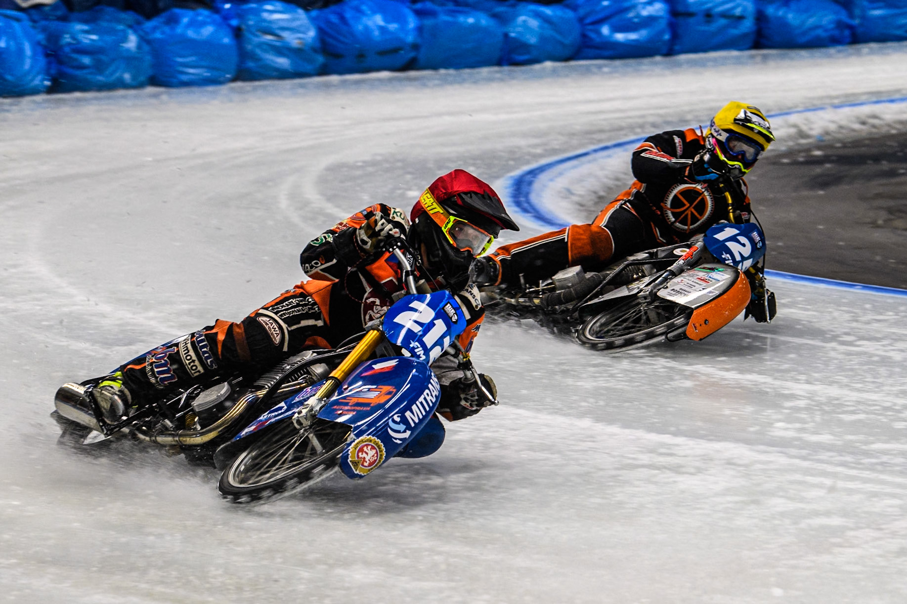 Lukas Hutla (212) of the Czech Republic rides outside Sebastian Reitsma (125) of The Netherlands during the Ice Speedway Gladiators World Championship Final 2 at Max-Aicher-Arena, Inzell on Sunday 16th March 2025. (Photo: Ian Charles | MI News)
