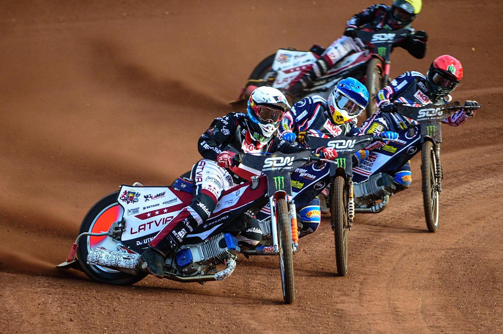 MANCHESTER, UK. OCT 16TH Andzejs Lebedevs of Latvia (White) leads Robert Lambert of Great Britain (Blue), Tai Woffinden of Great Britain (Red) and Olegs Mijailovs of Latvia (Yellow) during the Monster Energy FIM Speedway of Nations at the National Speedway Stadium, Manchester on Saturday  16th October 2021. (Credit: Ian Charles | MI News)