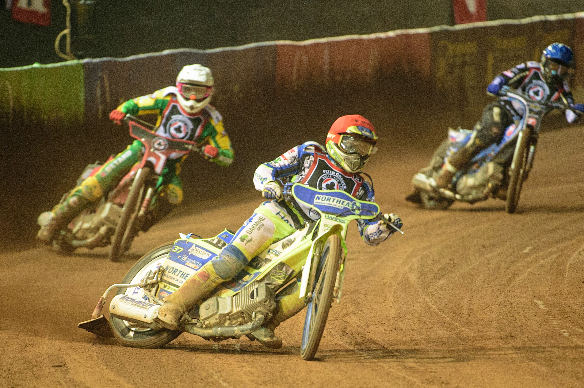 MANCHESTER, UK. MAR 21ST. Chris Harris (Red) leads Max Fricke (White) and Matej Žagar  (Blue) during the ATPI Peter Craven Memorial Trophy at the National Speedway Stadium, Manchester on Monday 21st March 2022. (Credit: Ian Charles | MI News)