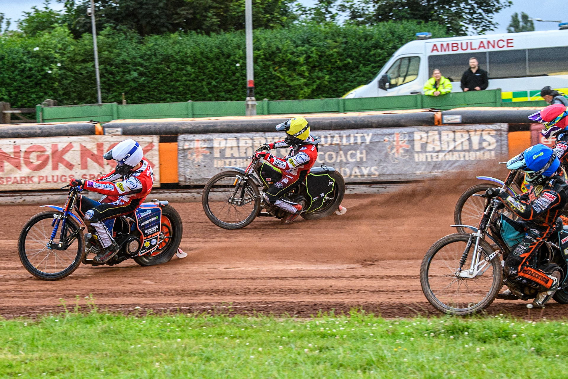 Brady Kurtz (White) and Tom Brennan (Yellow) go for maximum points ahead of Rory Schlein (Red) and Ryan Douglas (Blue) during the Sports Insure Premiership match between Wolverhampton Wolves and Belle Vue Aces at Monmore Green Stadium, Wolverhampton on Monday 10th July 2023. (Photo: Ian Charles | MI News)