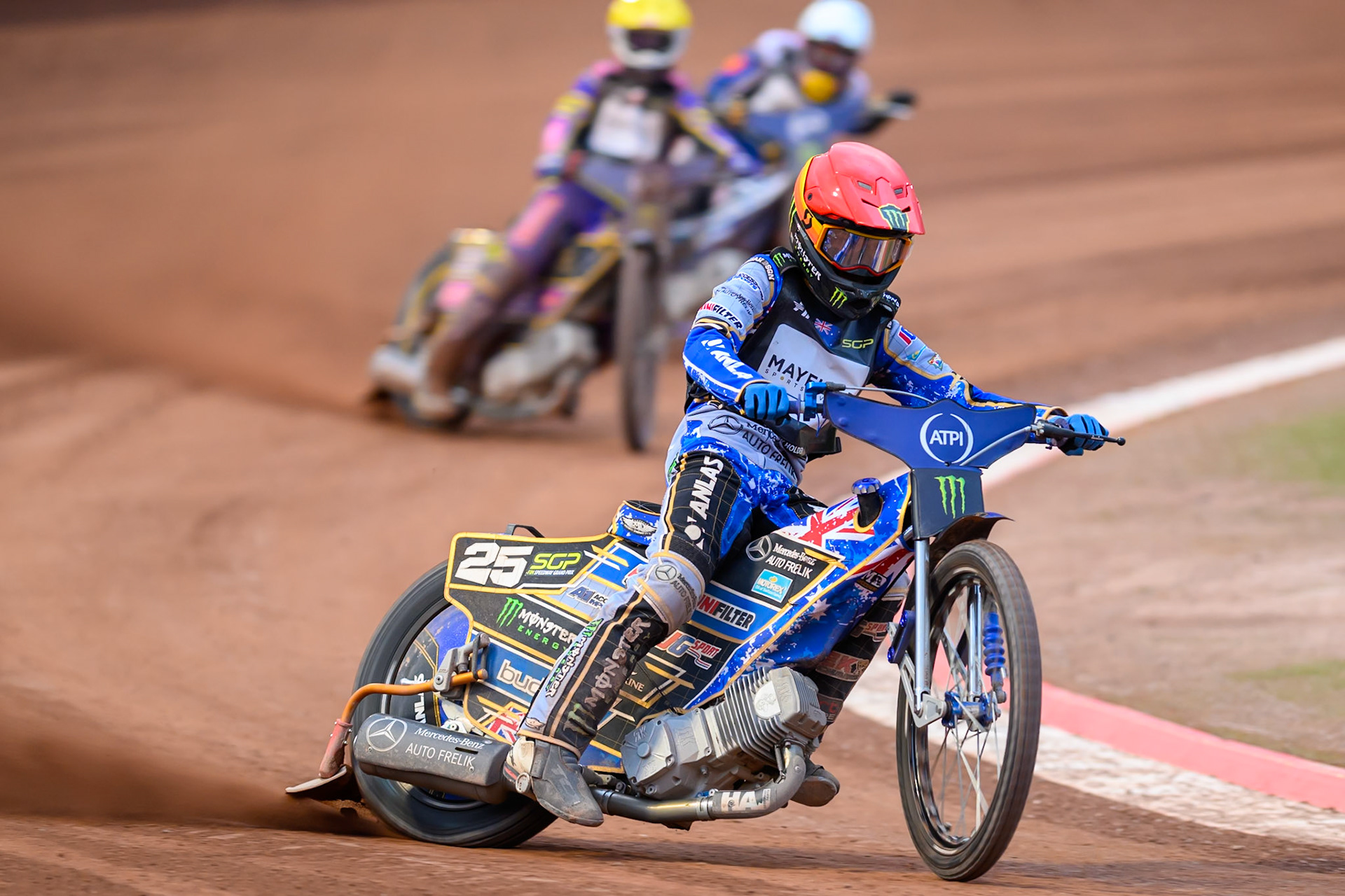 Jack Holder (25) of Australia in Red leading the Last Chance Heat 1 from Kacper Woryna (223) of Poland in Yellow and Robert Lambert (505) of Great Britain in White during the ATPI  FIM Speedway GP of Manchester at the National Speedway Stadium, Manchester on Saturday 6th June 2026. (Photo: Ian Charles | MI News)