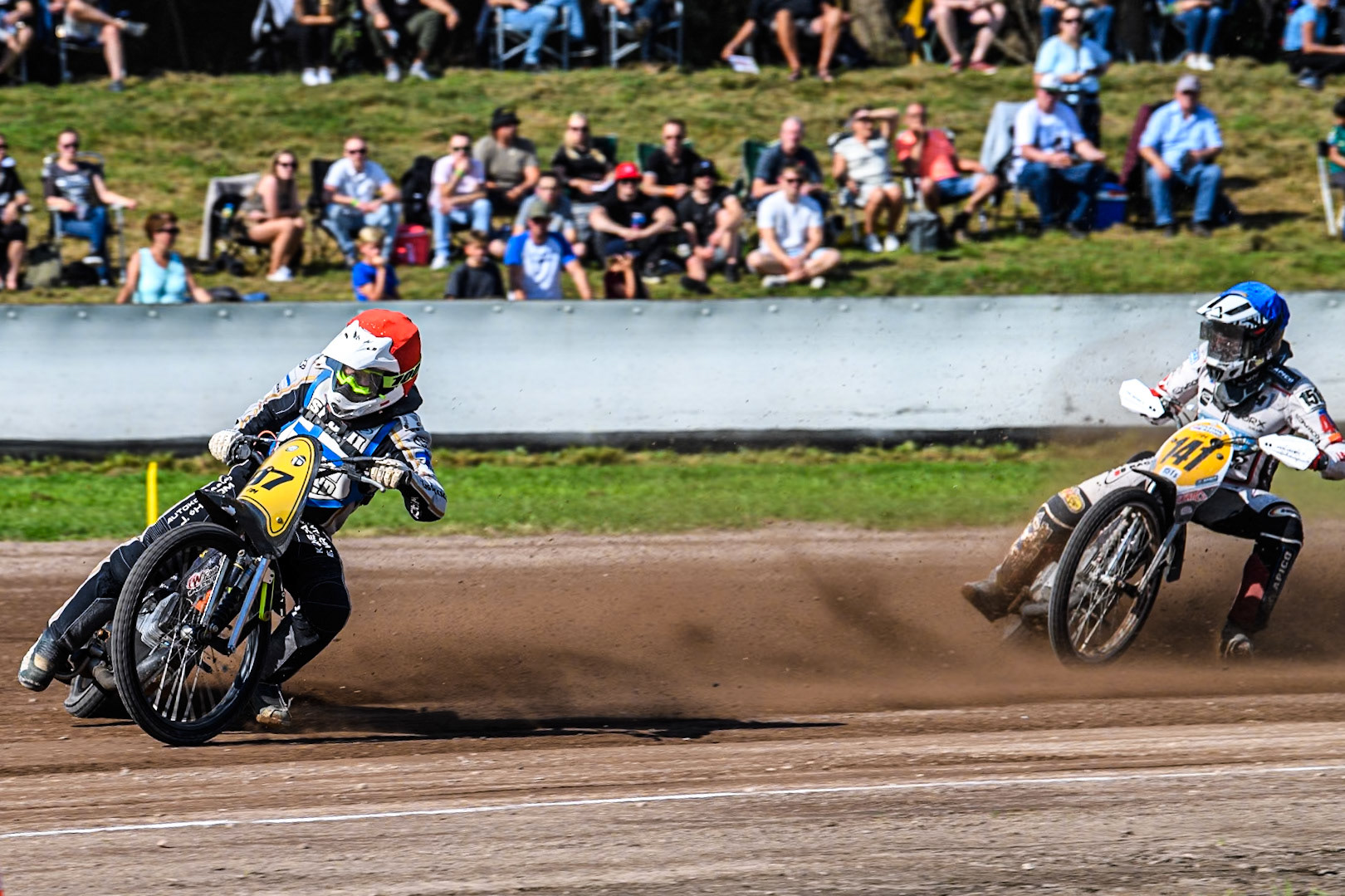 Henri Ahlbom (97) of Finland in Red leading Andrew Appleton (141) of Great Britain in Blue during the FIM Long Track World Championship Final 5 at the Speed Centre Roden, Roden, Netherlands on Sunday 22nd September 2024. (Photo: Ian Charles | MI News)