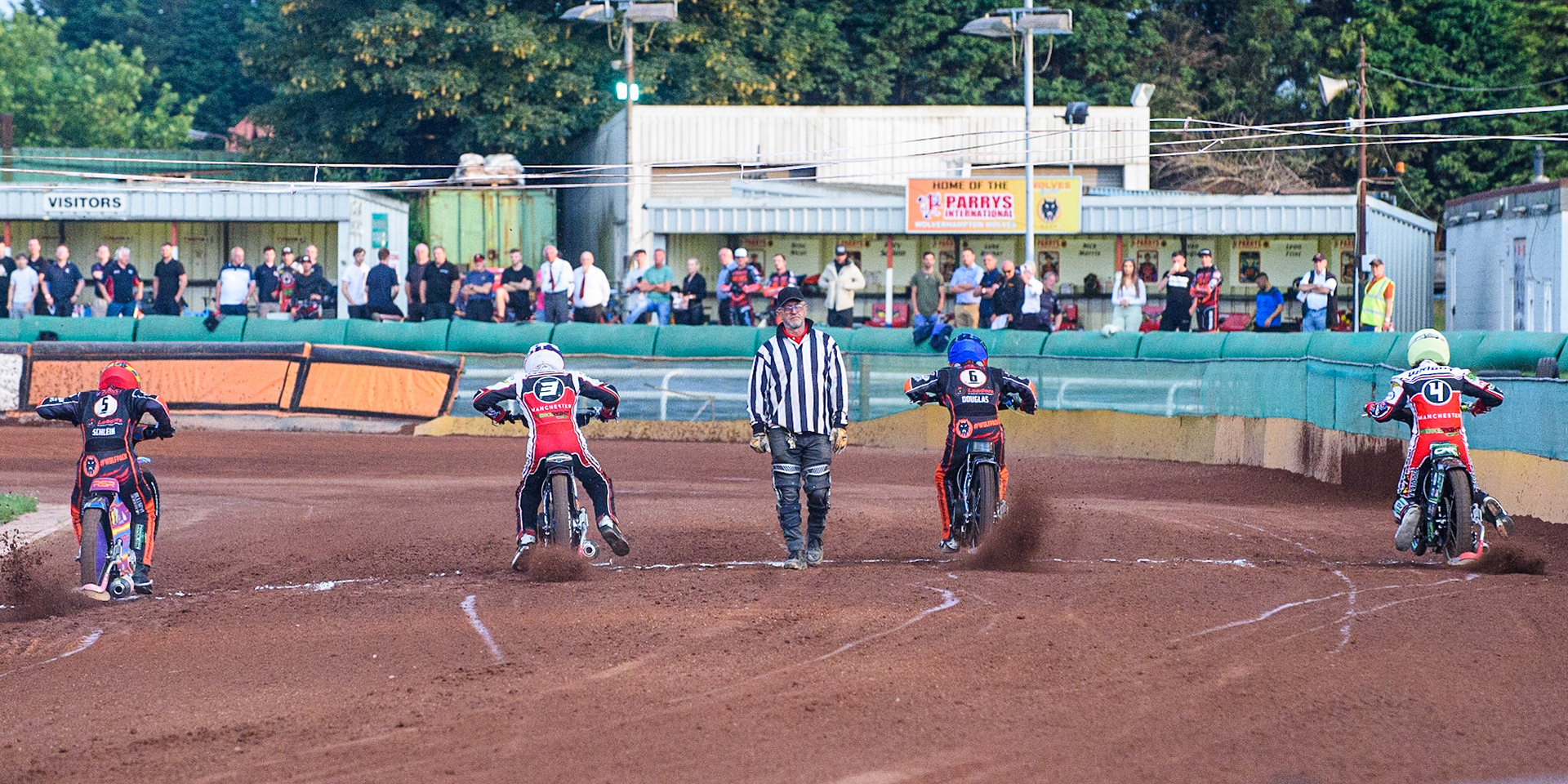 WOLVERHAMPTON, UK. JULY 26TH Start of heat 7 with (l-r) Rory Schlein  (Red), Steve Worrall  (White), Ryan Douglas (Blue) and Charles Wright  (Yellow) during the SGB Premiership match between Wolverhampton Wolves and Belle Vue Aces at the Ladbroke Stadium, Wolverhampton on Monday 26th July 2021. (Credit: Ian Charles | MI News)