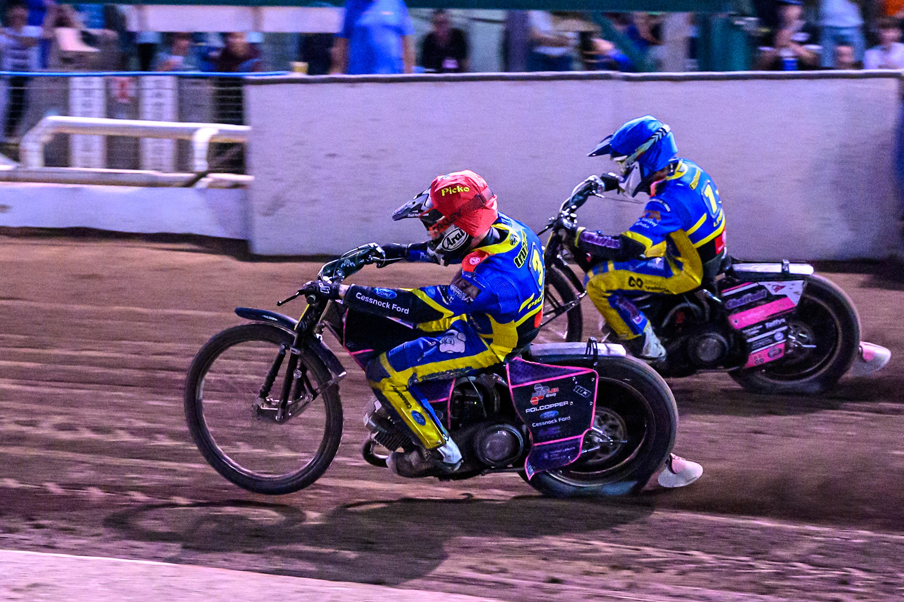 Josh Pickering of Sheffield Tigers in Red rides inside team mate Leon Flint in Blueduring the Rowe Motor Oil Premiership match between Sheffield Tigers and Belle Vue Aces at Owlerton Stadium, Sheffield on Monday 11th August 2025. (Photo: Ian Charles | MI News)