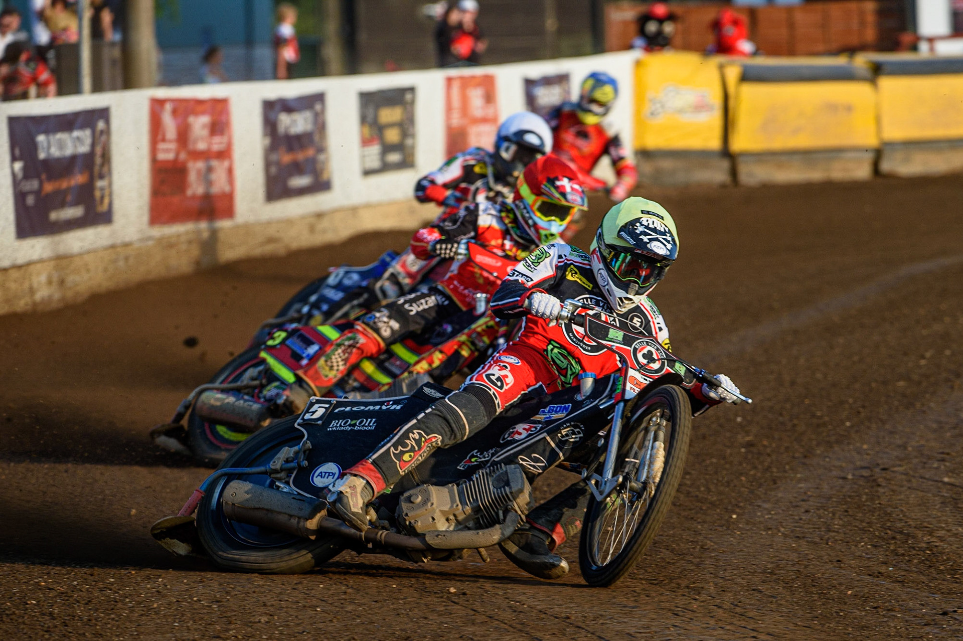PETERBOROUGH, UK. JULY 19TH   Dan Bewley  (Yellow) on his way to breaking the Peterborough track record as he leads Michael Palm-Toft  (Red) Brady Kurtz  (White) and Scott Nicholls   (Blue)during the SGB Premiership match between Peterborough and Belle Vue Aces at East of England Showground, Peterborough on Monday 19th July 2021. (Credit: Ian Charles | MI News)