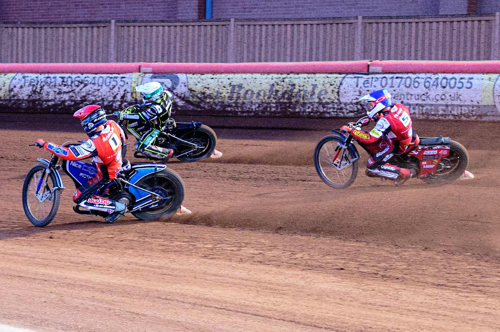 Matej Zagar  (Red) inside Jason Doyle  (White) with Max Fricke  (Blue) chasing during the SGB Premiership match between Belle Vue Aces and Ipswich Witches at the National Speedway Stadium, Manchester on Monday 8th August 2022. (Credit: Ian Charles | MI News)