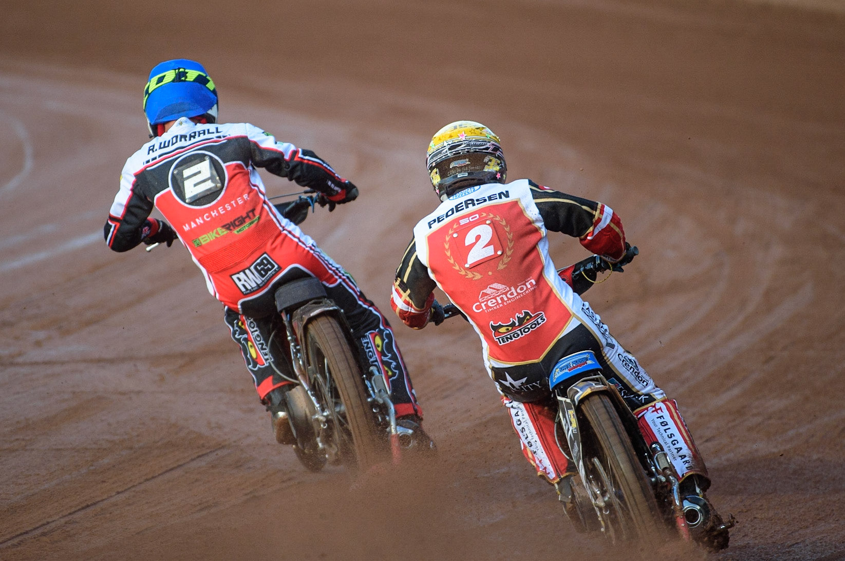 MANCHESTER, UK. AUG 9TH  Bjarne Pedersen  (Yellow) chases Richie Worrall  (Blue) during the SGB Premiership match between Belle Vue Aces and Peterborough at the National Speedway Stadium, Manchester on Monday 9th August 2021. (Credit: Ian Charles | MI News)