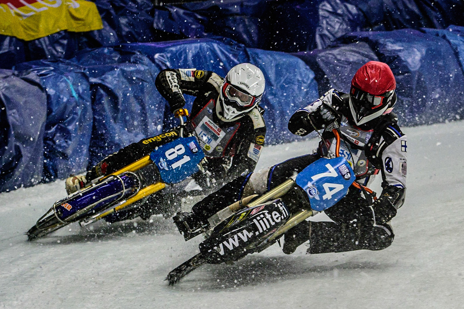 Mats Järf (74) (Red) inside Jimmy Olsen (81) (White) during the Ice Speedway Gladiators World Championship Final 1 at Max-Aicher-Arena, Inzell, Germany on Saturday 18th March 2023. (Photo: Ian Charles | MI News)