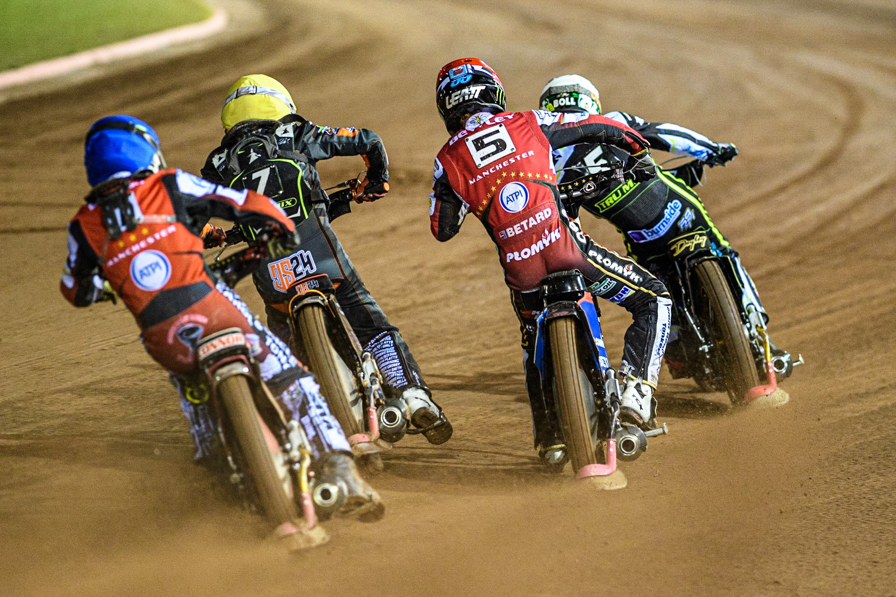 Connor Bailey (Blue) and Dan Bewley (Red) chase Jack Smith (Yellow) and Jason Doyle (White) during the Sports Insure Premiership Semi Final Playoff 2nd leg match between Belle Vue Aces and Ipswich Witches at the National Speedway Stadium, Manchester on Monday 25th September 2023. (Photo: Ian Charles | MI News)