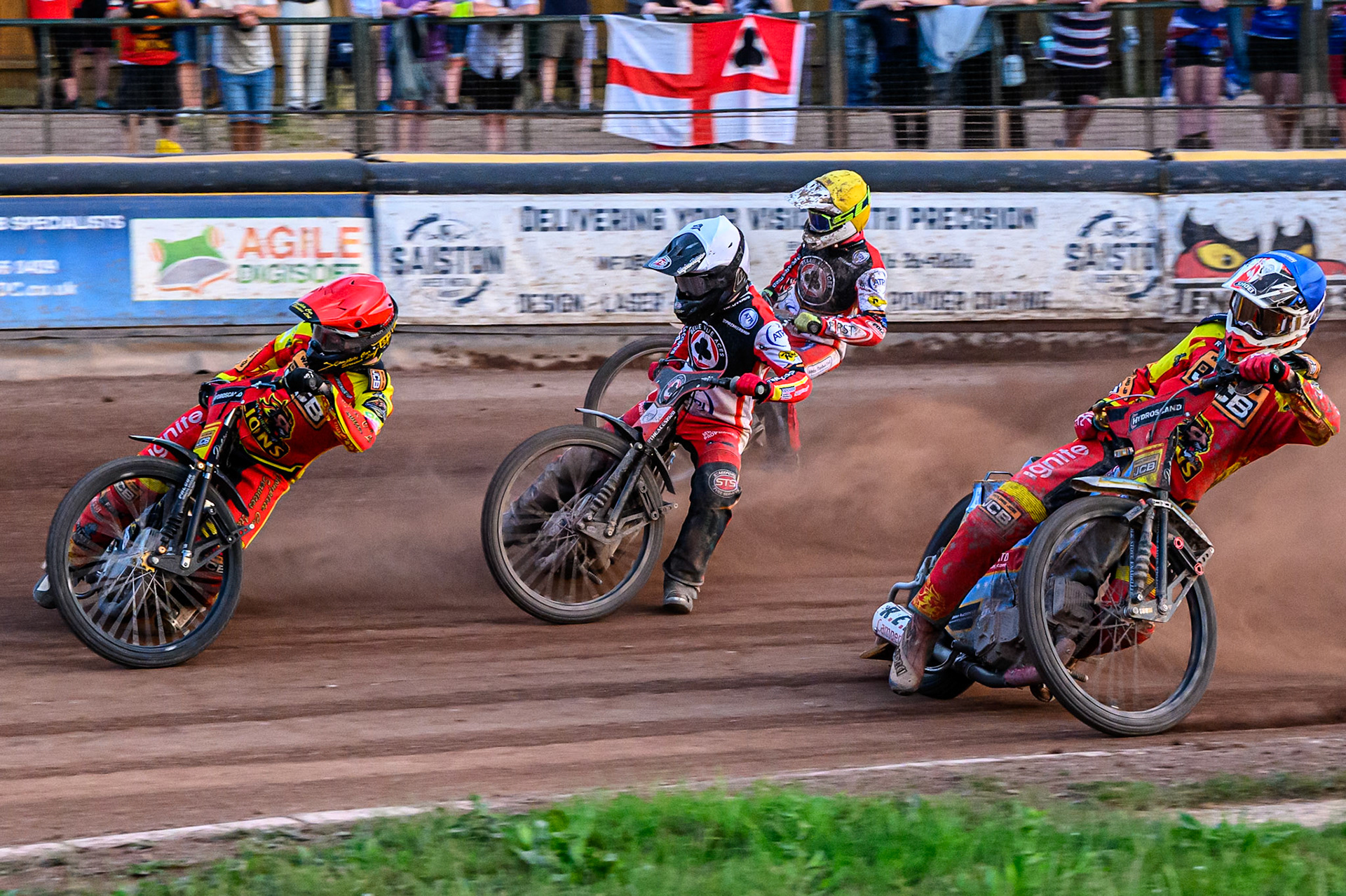 Leicester Lions' Kyle Howarth in Red leading Belle Vue Aces' Zach Cook in White, Belle Vue Aces' Jake Mulford in Yellow and Leicester Lions' Drew Kemp in Blue during the Rowe Motor Oil Premiership match between Leicester Lions and Belle Vue Aces at the Hydroscand Arena, Leicester on Thursday 19th June 2025. (Photo: Ian Charles | MI News)