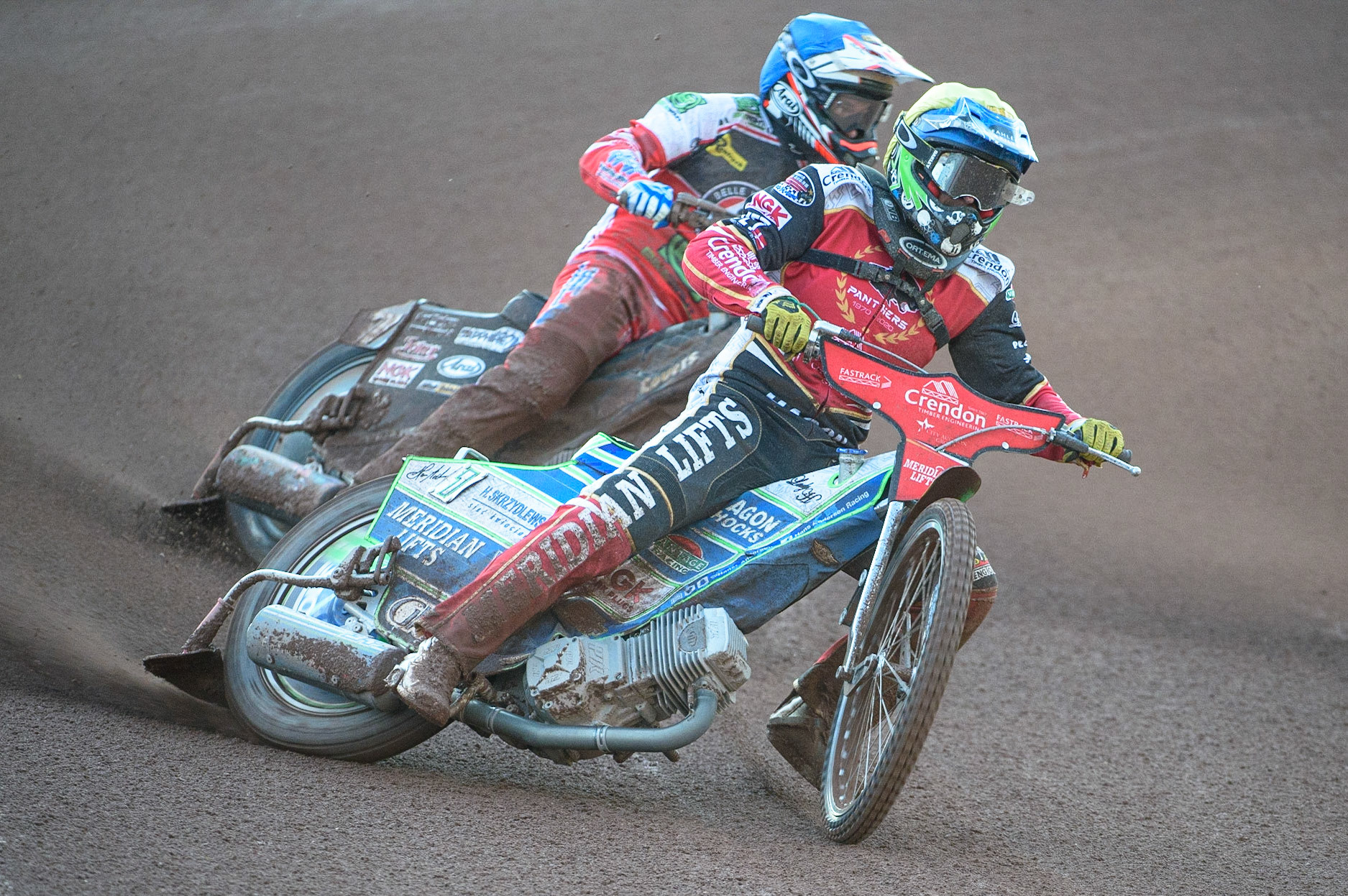 MANCHESTER, UK. AUG 9TH   Hans Andersen  (Yellow) leads Ricky Wells  (Blue) during the SGB Premiership match between Belle Vue Aces and Peterborough at the National Speedway Stadium, Manchester on Monday 9th August 2021. (Credit: Ian Charles | MI News)