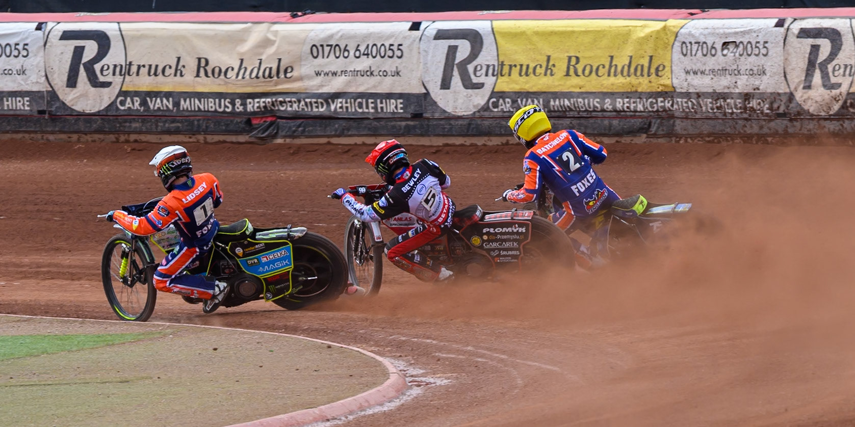 (L to R) Jaimon Lidsey of Northampton Foxes in White. Dan Bewley of Belle Vue Aces in Red and Troy Batchelor of Northampton Foxes in Yellow during the Rowe Motor Oil Premiership match between Belle Vue Aces and Northampton Foxes at the National Speedway Stadium, Manchester on Monday 4th May 2026. (Photo: Ian Charles | MI News)