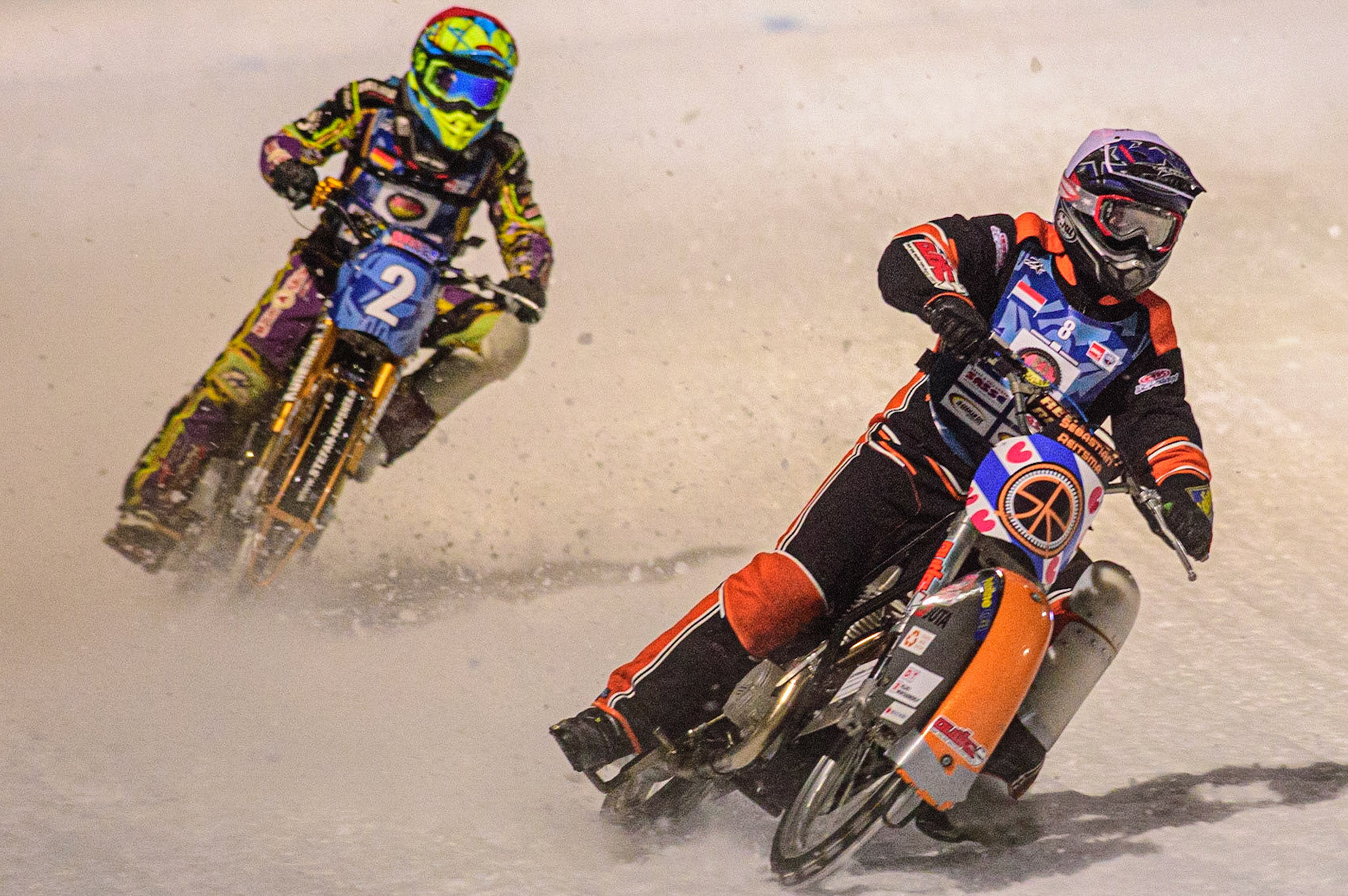 Sebastian Reitsma (White) leads Maximillian Neidermaier (Red) during the German Individual Ice Speedway Championship at Horst-Dohm-Eisstadion, Berlin on Friday 3rd March 2023. (Photo: Ian Charles | MI News)