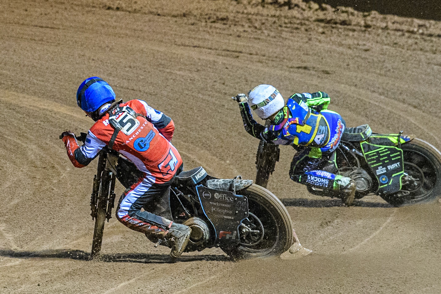 Belle Vue Colts' Freddy Hodder in Blue rides inside Sheffield Cubs' Nathan Ablitt in White during the WSRA National Development League match between Belle Vue Colts and Sheffield Tiger Cubs at the National Speedway Stadium, Manchester on Monday 7th October 2024. (Photo: Ian Charles | MI News)