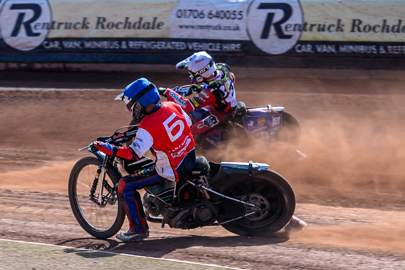 Harry Fletcher of Belle Vue Colts  in Blue rides inside Stene Pijper of Middlesborough Tigers  in White during the WSRA National Development League match between Belle Vue Colts and Middlesbrough Tigers at the National Speedway Stadium, Manchester on Sunday 10th August 2025. (Photo: Mark Fletcher | MI News)