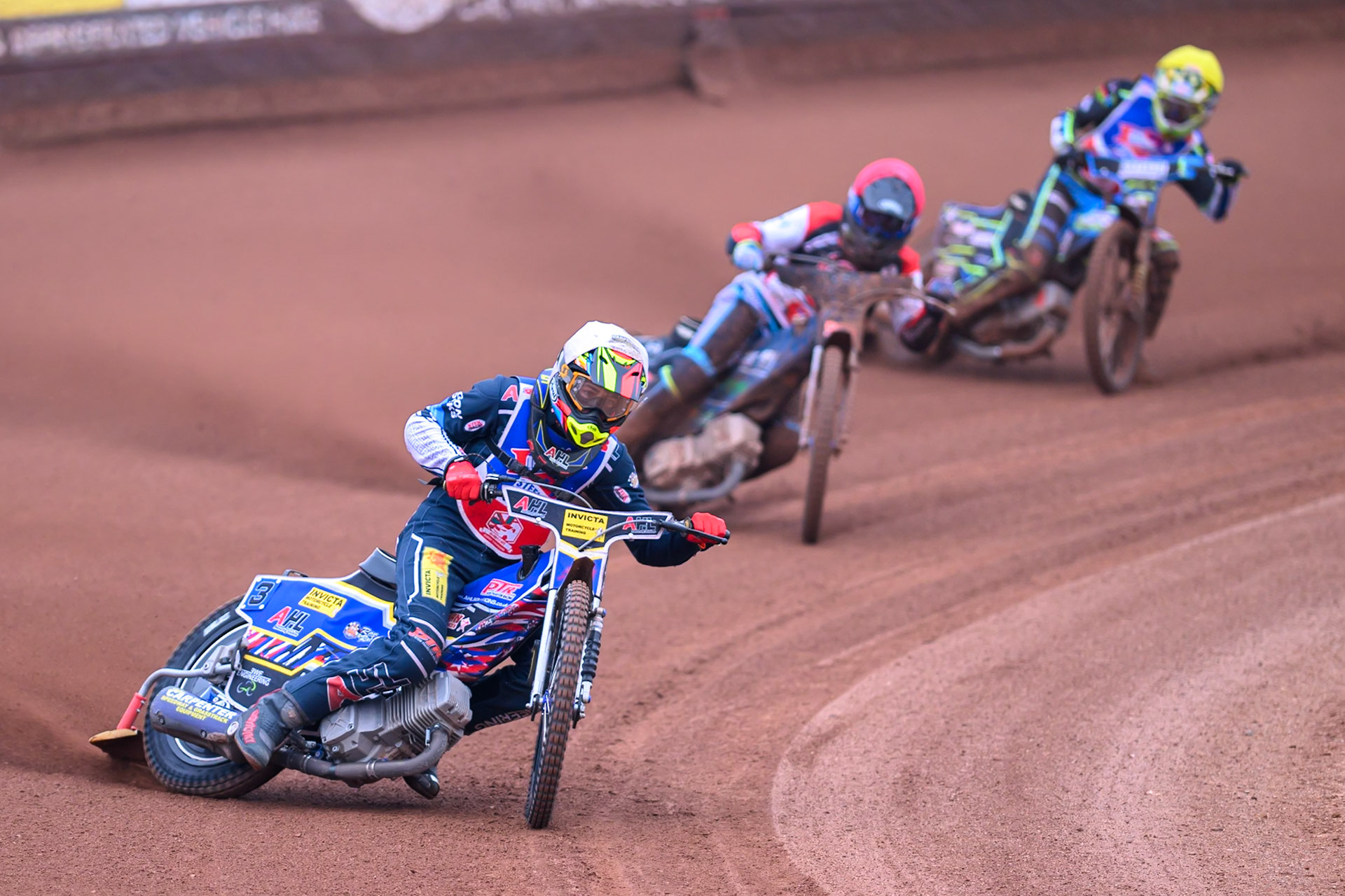Steelers' Jamie Etherington in White leading Belle Vue Colts' Jack Kingston in Red and Steelers' Guest Rider Senna Summers  in Yellow during the WSRA National Development League match between Belle Vue Colts and Sheffield/Scunthorpe Steelers at the National Speedway Stadium, Manchester on Sunday 12th October 2025. (Photo: Ian Charles | MI News)