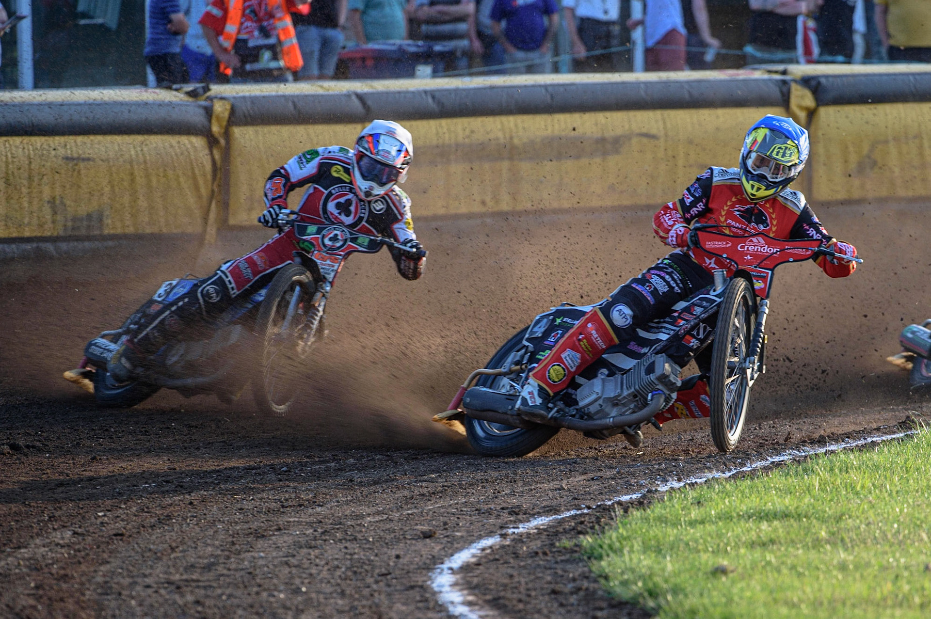 PETERBOROUGH, UK. JULY 19TH  Scott Nicholls   (Blue) passes Steve Worrall  (White) on the inside  during the SGB Premiership match between Peterborough and Belle Vue Aces at East of England Showground, Peterborough on Monday 19th July 2021. (Credit: Ian Charles | MI News)