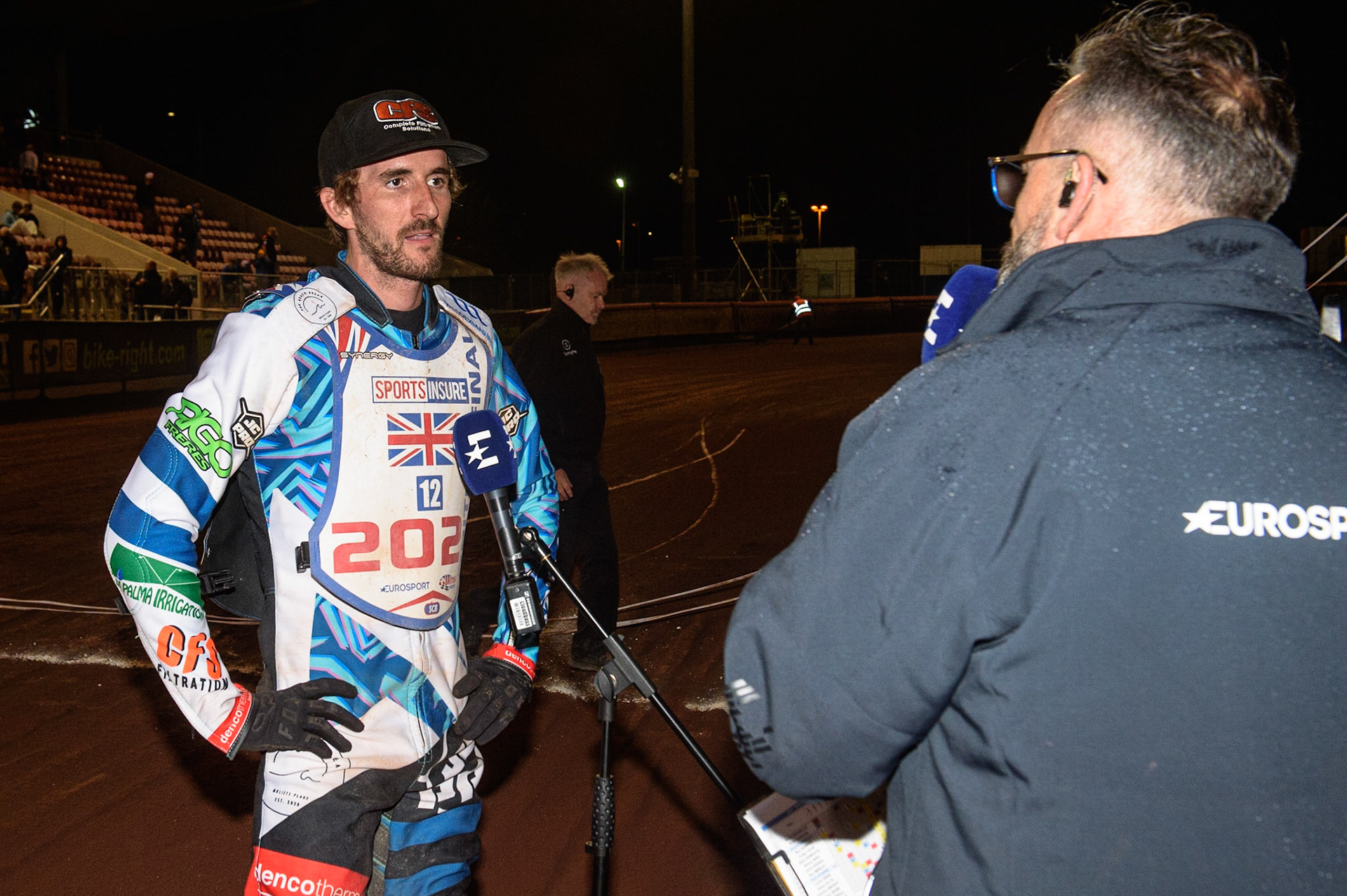 MANCHESTER, UK. AUGUST 16TH   Adam Ellis  is interviewed by Steve Brandon from Eurosport during the Sports Insure British Speedway Finals at the National Speedway Stadium, Manchester on Monday 16th August 2021. (Credit: Ian Charles | MI News)