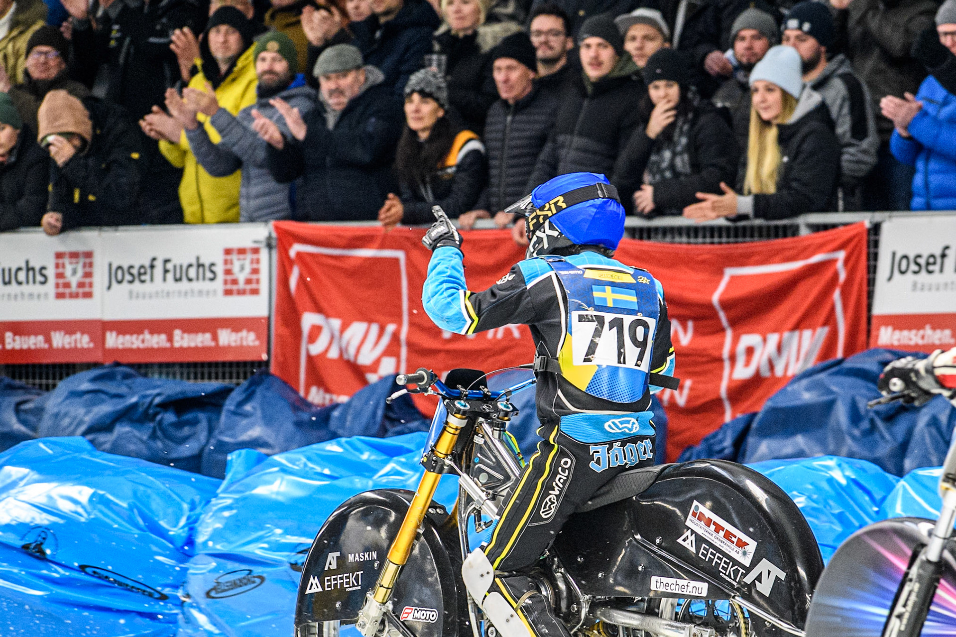 Filip Jäger (719) of Sweden acknowledges the crowd after his heat win during the Ice Speedway Gladiators World Championship Final 2 at Max-Aicher-Arena, Inzell on Sunday 16th March 2025. (Photo: Ian Charles | MI News)