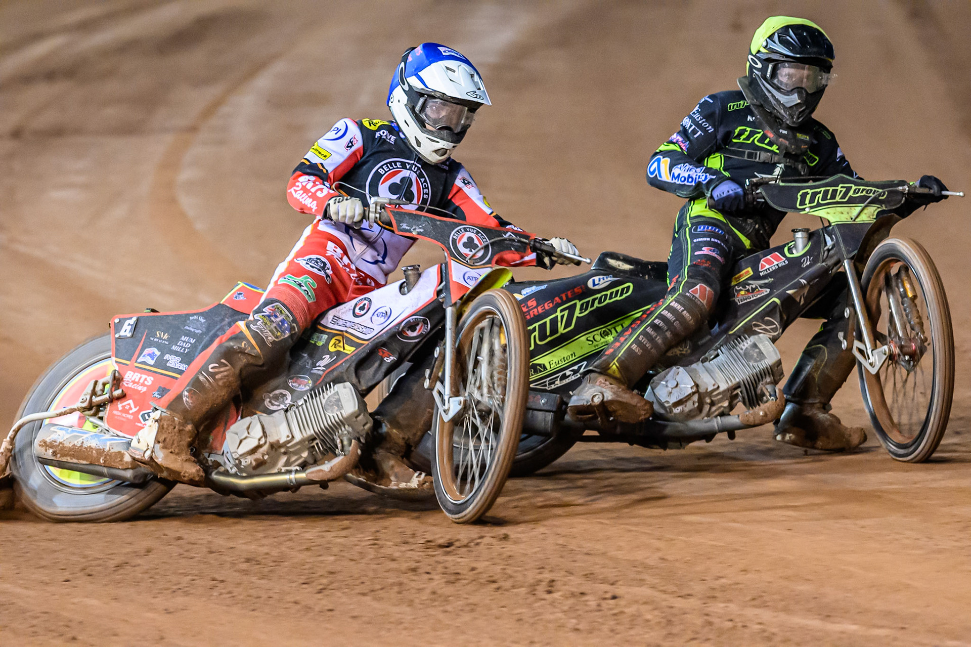 Tate Zischke of Belle Vue Aces in Blue rides outside Dan Thompson of Ipswich Witches  in Yellow during the Rowe Motor Oil Premiership Play Off Semi Final 1 (1st Leg)  between Belle Vue Aces and Ipswich Witches at the National Speedway Stadium, Manchester on Monday 8th September 2025. (Photo: Ian Charles | MI News)
