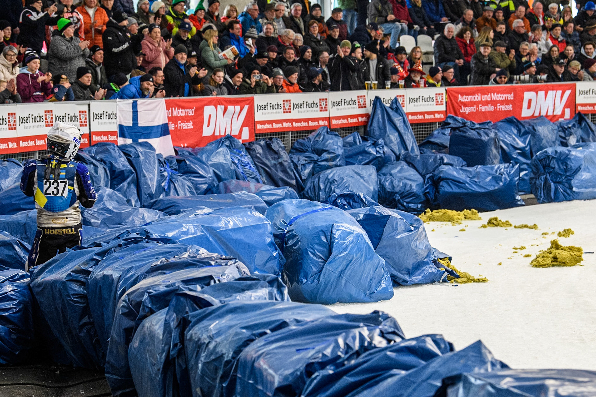 Sweden's Jimmy Hörnell Lidfalk (237) stans amongst the bales after his crash during the FIM Ice Speedway Gladiators World Championship Final 2 at the Max-Aicher-Arena, Inzell on Sunday 24 March 2024. (Photo: Ian Charles | MI News)