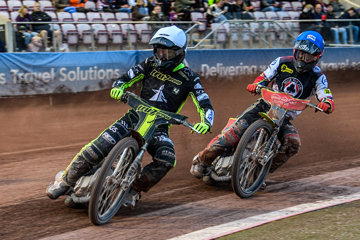 Ipswich Witches' Adam Ellis in White leading Belle Vue Aces' Tate Zischke  in Blue during the Rowe Motor Oil Premiership match between Belle Vue Aces and Ipswich Witches at the National Speedway Stadium, Manchester on Monday 1st July 2024. (Photo: Ian Charles | MI News)