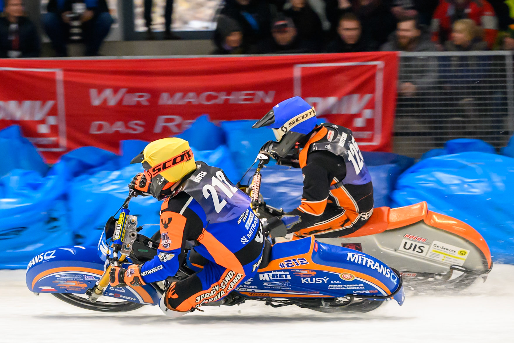 Lukas Hutla (212) of Czechia in Yellow rides inside Sebastian Reitsma (125) of The Netherlands in Blue during the Ice Speedway Gladiators World Championship Final 2 at Max-Aicher-Arena, Inzell on Sunday 15th March 2026. (Photo: Ian Charles | MI News)