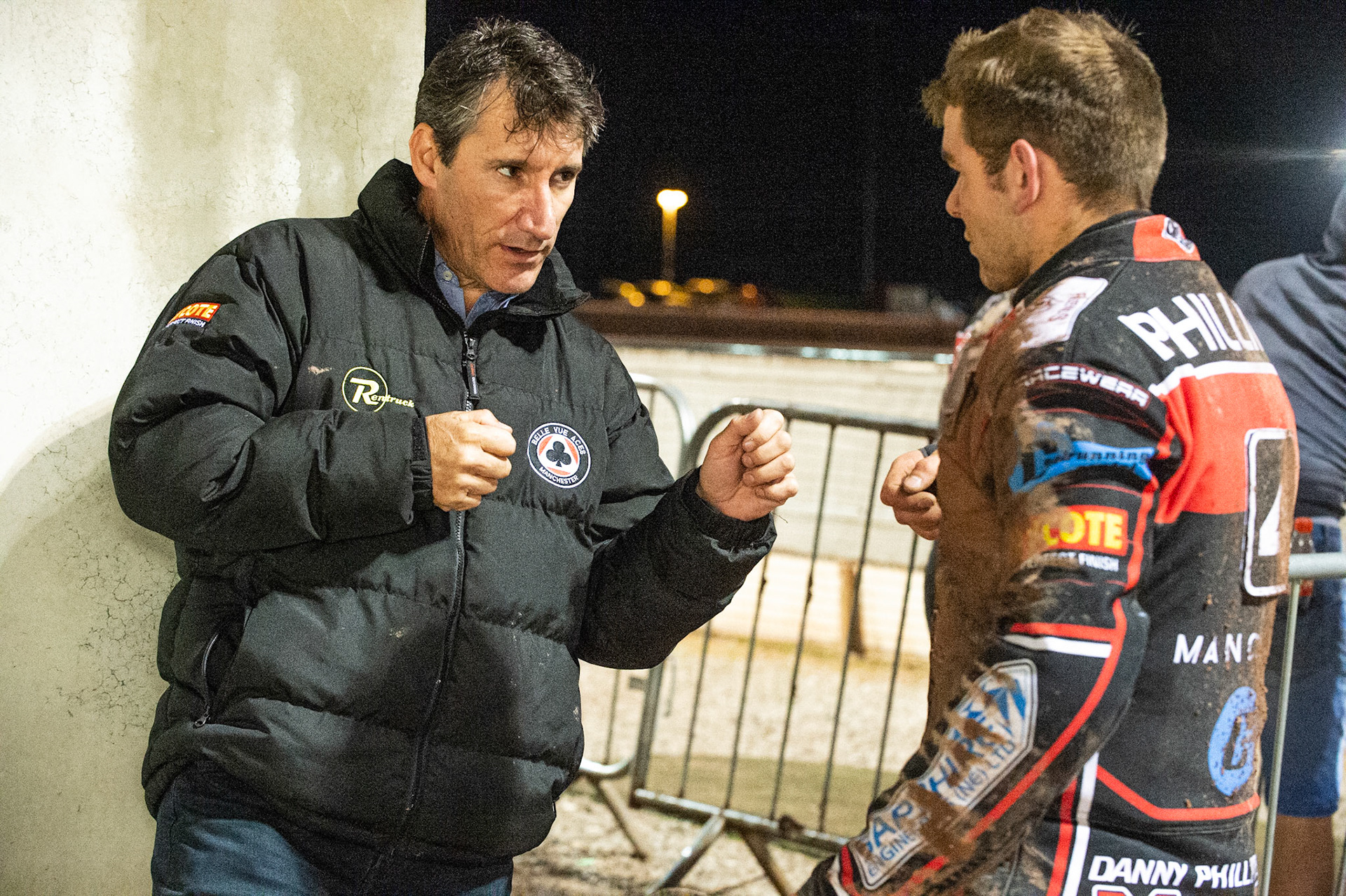 Photo: Ian Charles

Mark Lemon (left) passes on some advice to Danny Phillips 

Belle Vue Colts v Mildenhall Fen Tigers, National League, Belle Vue National Speedway Stadium, Manchester, Monday 2  September  2019